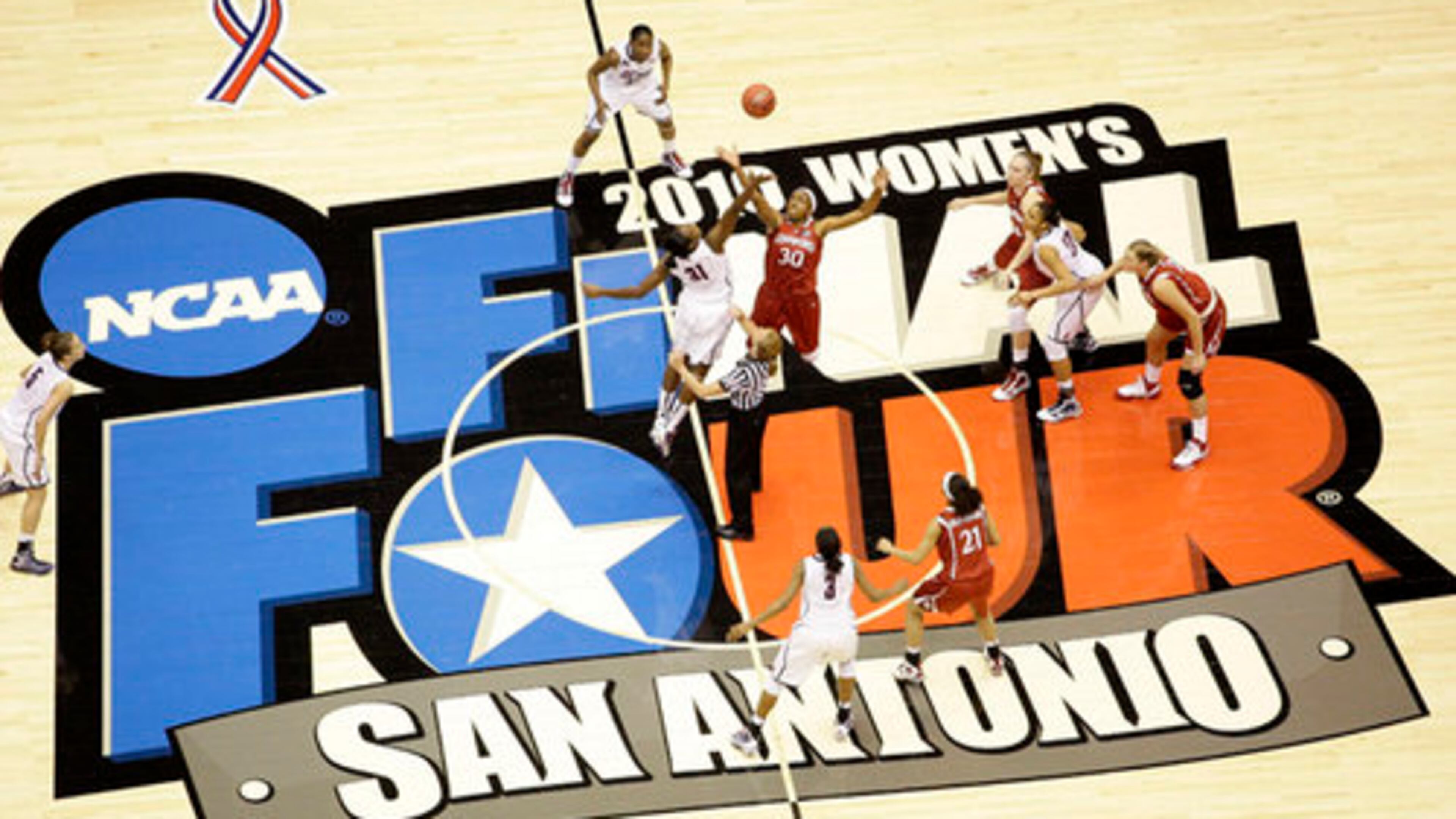 Connecticut's Tina Charles (31) and Stanford's Nnemkadi Ogwumike (30) leap up for the tip off to begin the first half of the women's NCAA Final Four college basketball championship game Tuesday, April 6, 2010, in San Antonio.