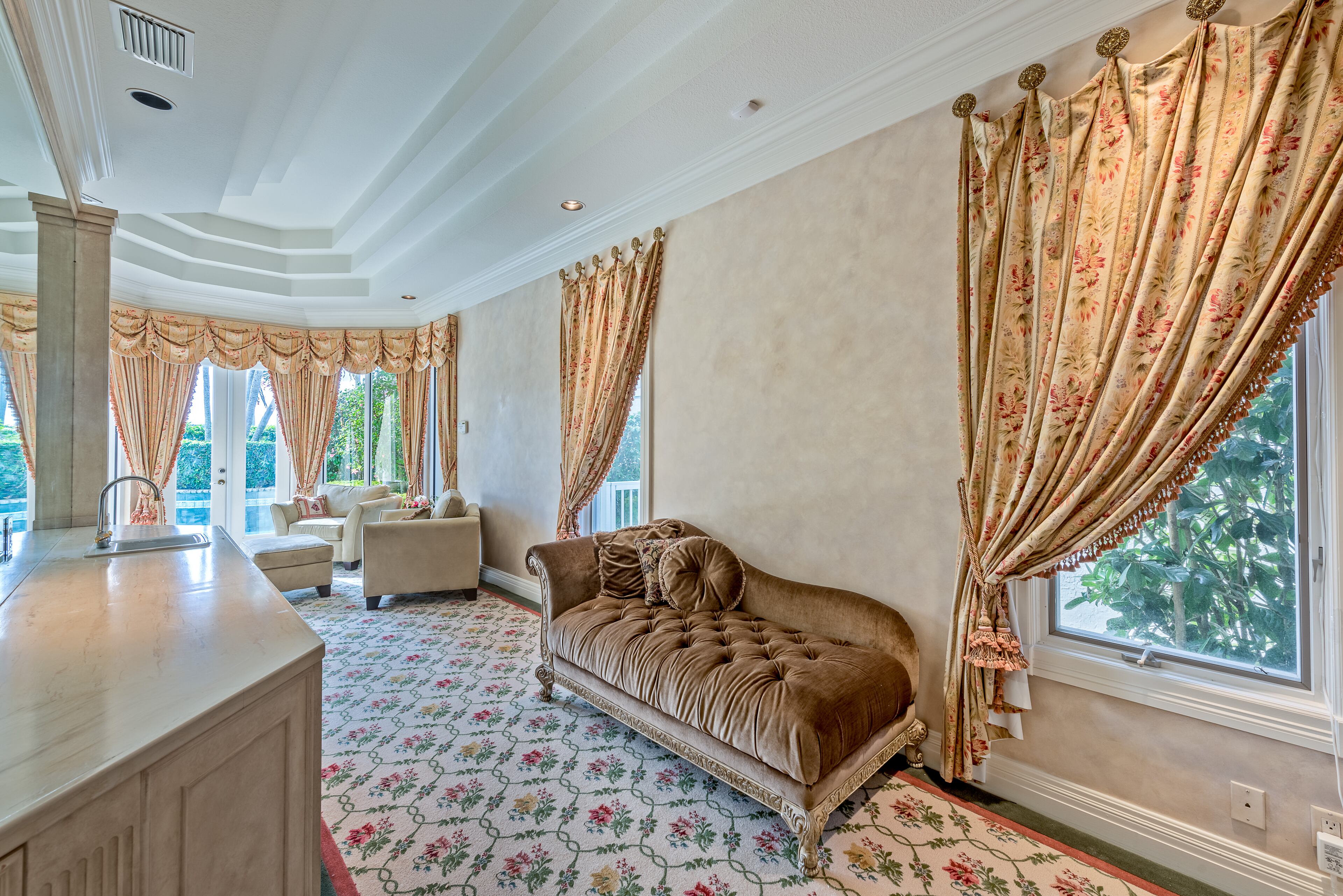 Former GOP presidential hopeful and the future HUD secretary Ben Carson has listed his golf-club community home in Palm Beach, Fla. for $1.2 million. The two-story residence has soaring floor-to-ceiling windows that wonderfully blend the the outside tropical paradise with the interior living spaces. This five bedroom, 6000 ft., and 4.5 bathroom is a mini-mansion that comes with marble floors, custom built-in's throughout, remote operated window coverings along with a tastefully upgraded chefs kitchen. (Listing courtesy ENGEL & VOLKERS Palm Beach)