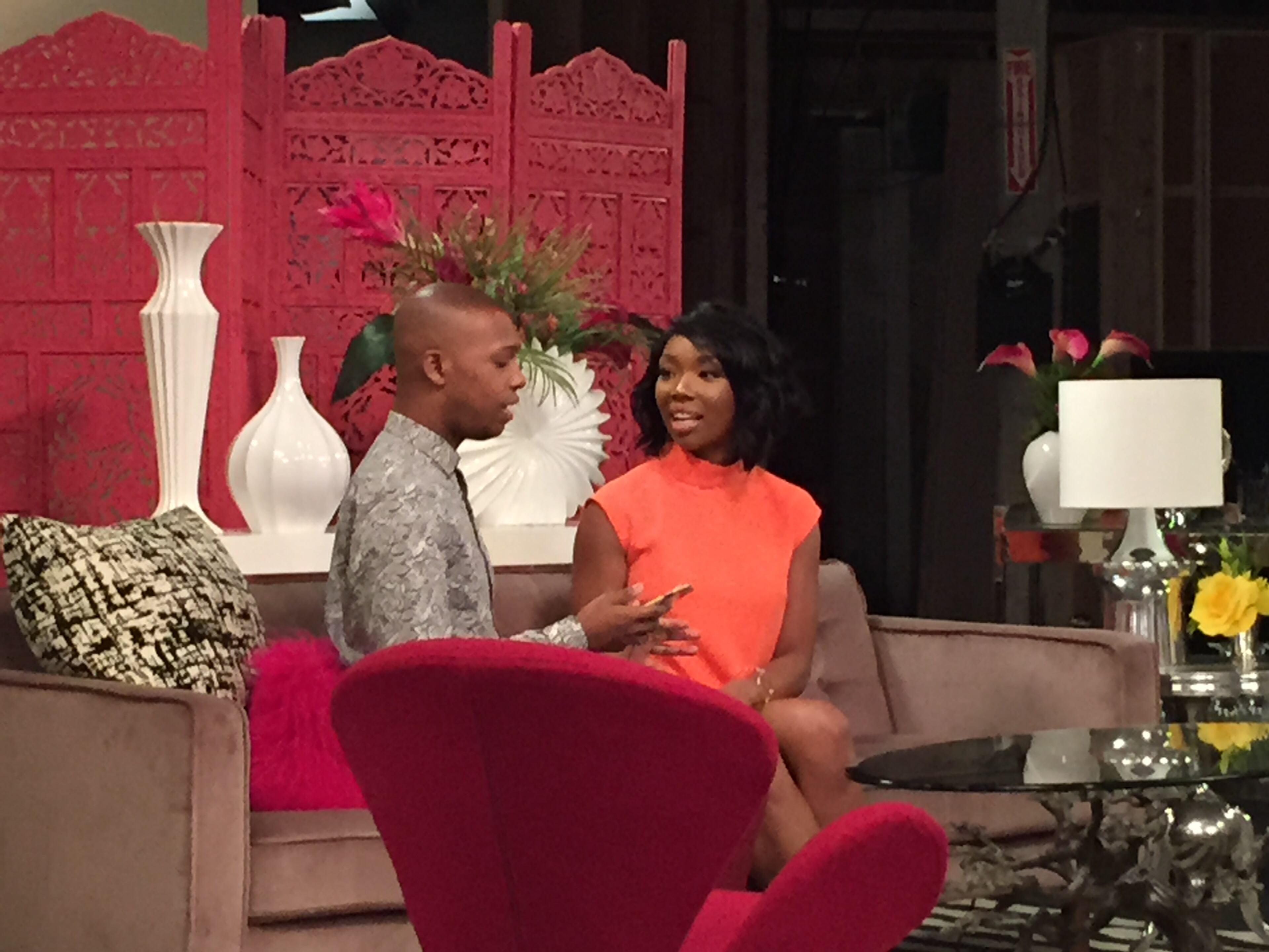 Brandy Norwood (right) with Tory Devon Smith, who plays Valente on "Zoe Ever After" during my set visit on September 28, 2015. CREDIT: Rodney HO/ rho@ajc.com