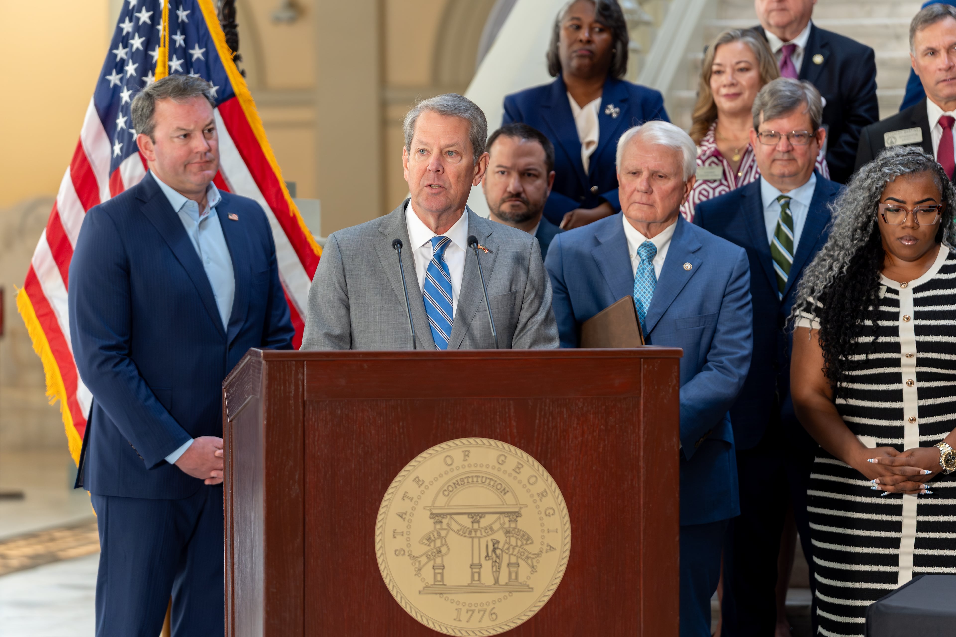 Gov. Brian Kemp speaks before signing multiple pieces of legislation inside the Georgia state Capitol on Monday. (Ben Hendren for the AJC)