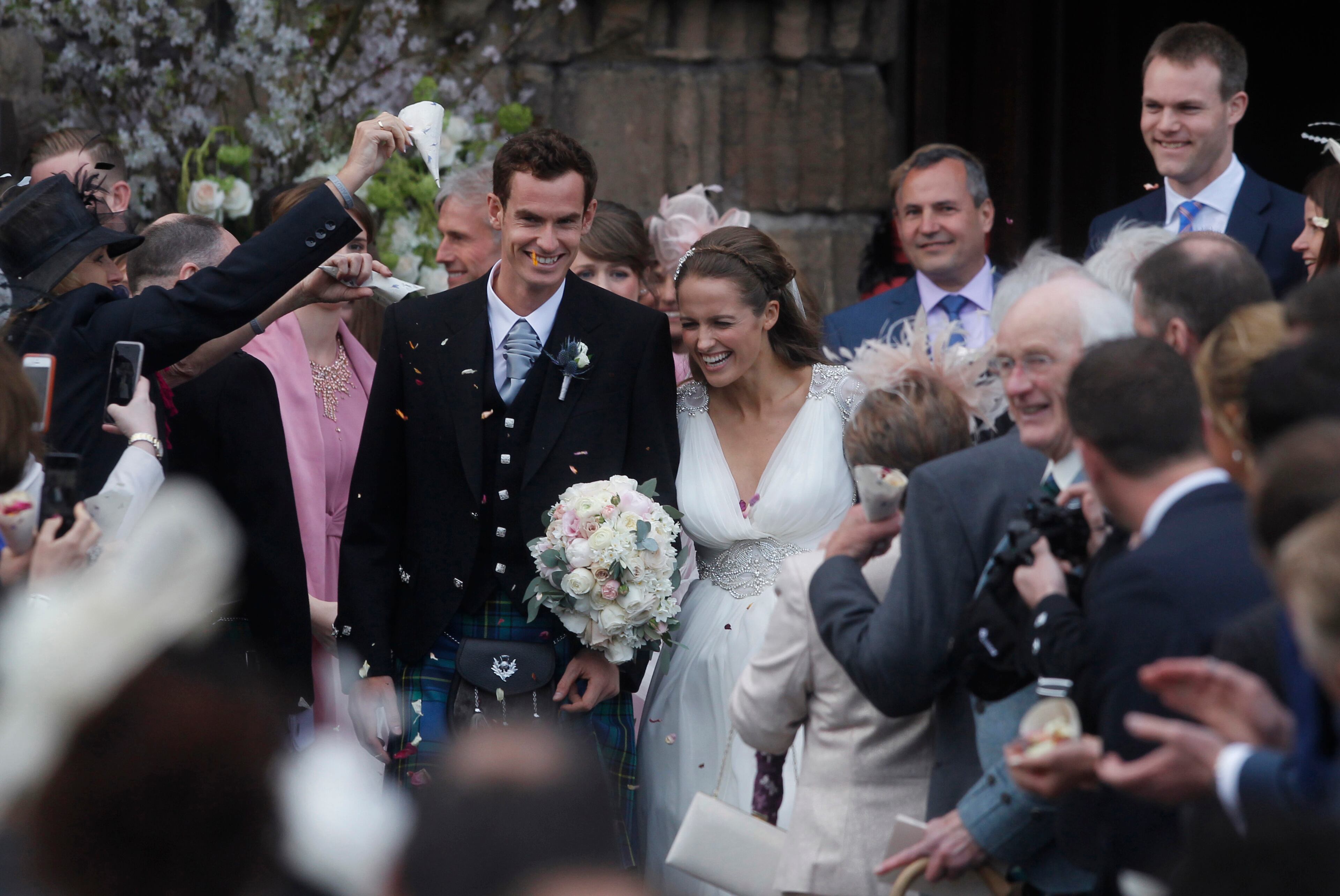 Britain's Andy Murray and Kim Sears leave Dunblane Cathedral in Scotland after their wedding, Saturday April 11, 2015. (AP Photo/PA, Andrew Milligan) UNITED KINGDOM OUT NO SALES NO ARCHIVE