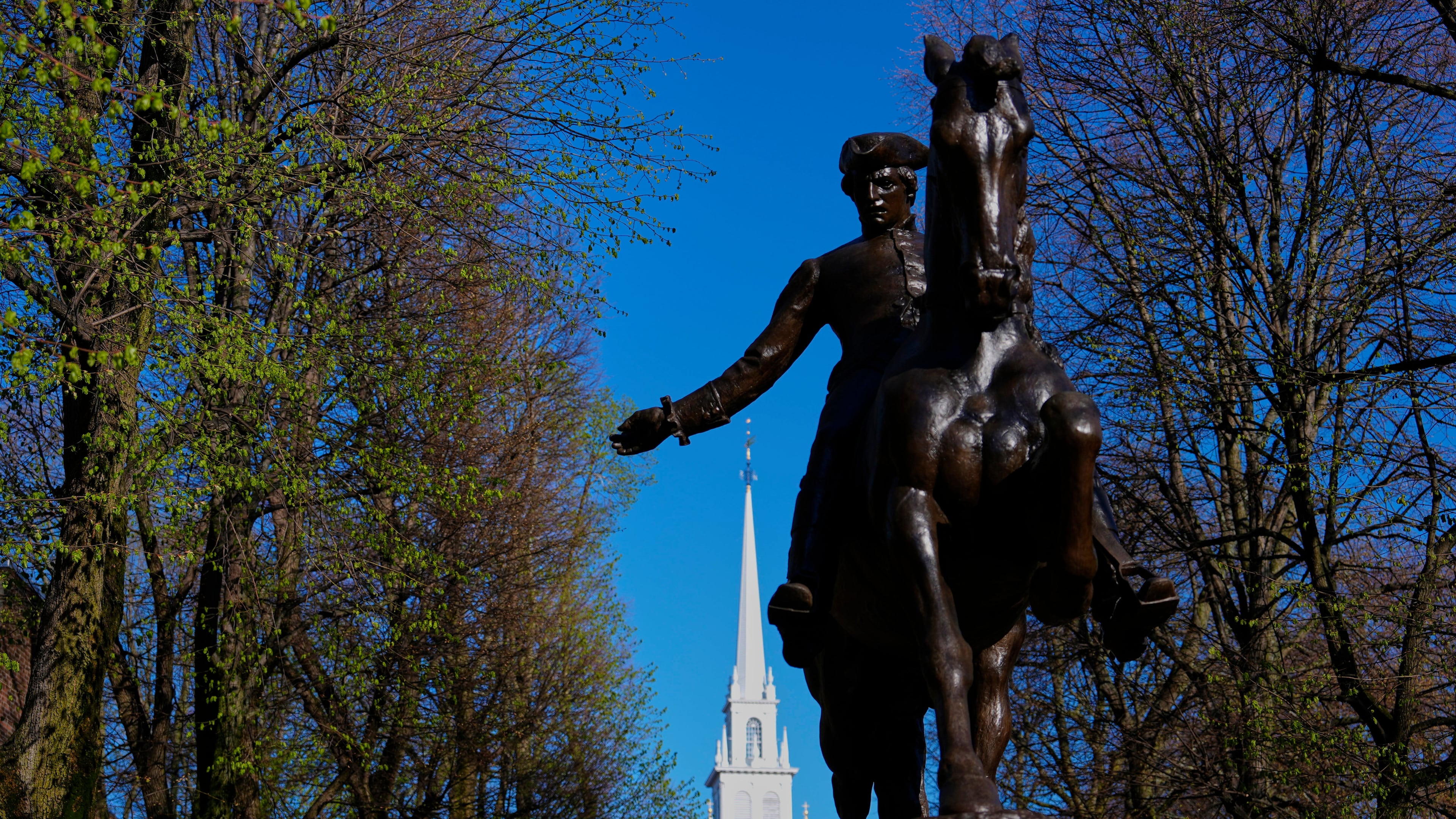 FILE - A statue of American patriot Paul Revere, famous for his 1775 ride to alert colonists of approaching British troops, stands near the Old North Church, Monday, April 20, 2026, in Boston. (AP Photo/Robert F. Bukaty, File)