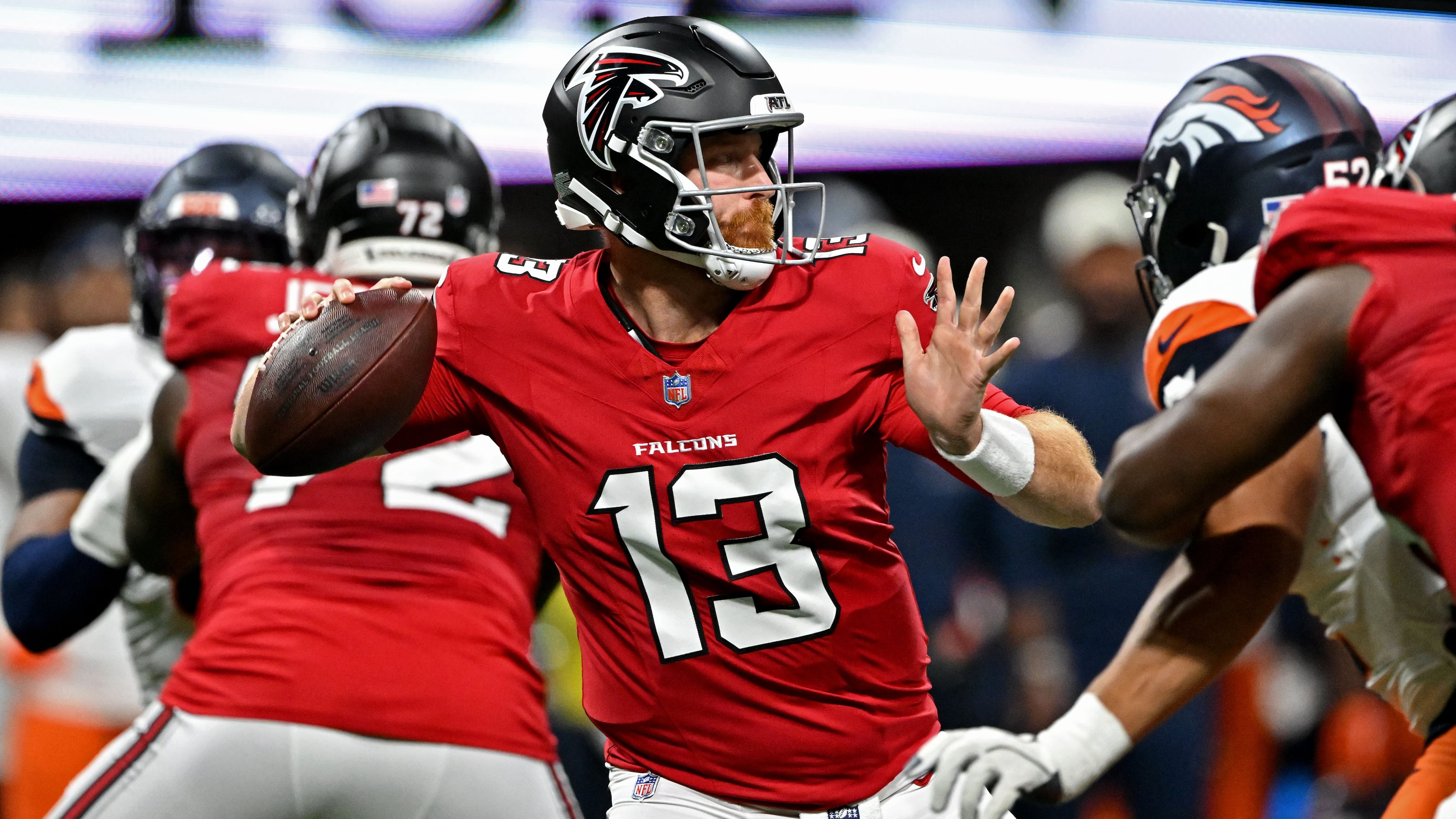 Atlanta Falcons quarterback Cooper Rush gets off a pass during the first half of an NFL preseason game at Mercedes-Benz Stadium on Friday, Aug. 14, 2026, in Atlanta. (Hyosub Shin/AJC)