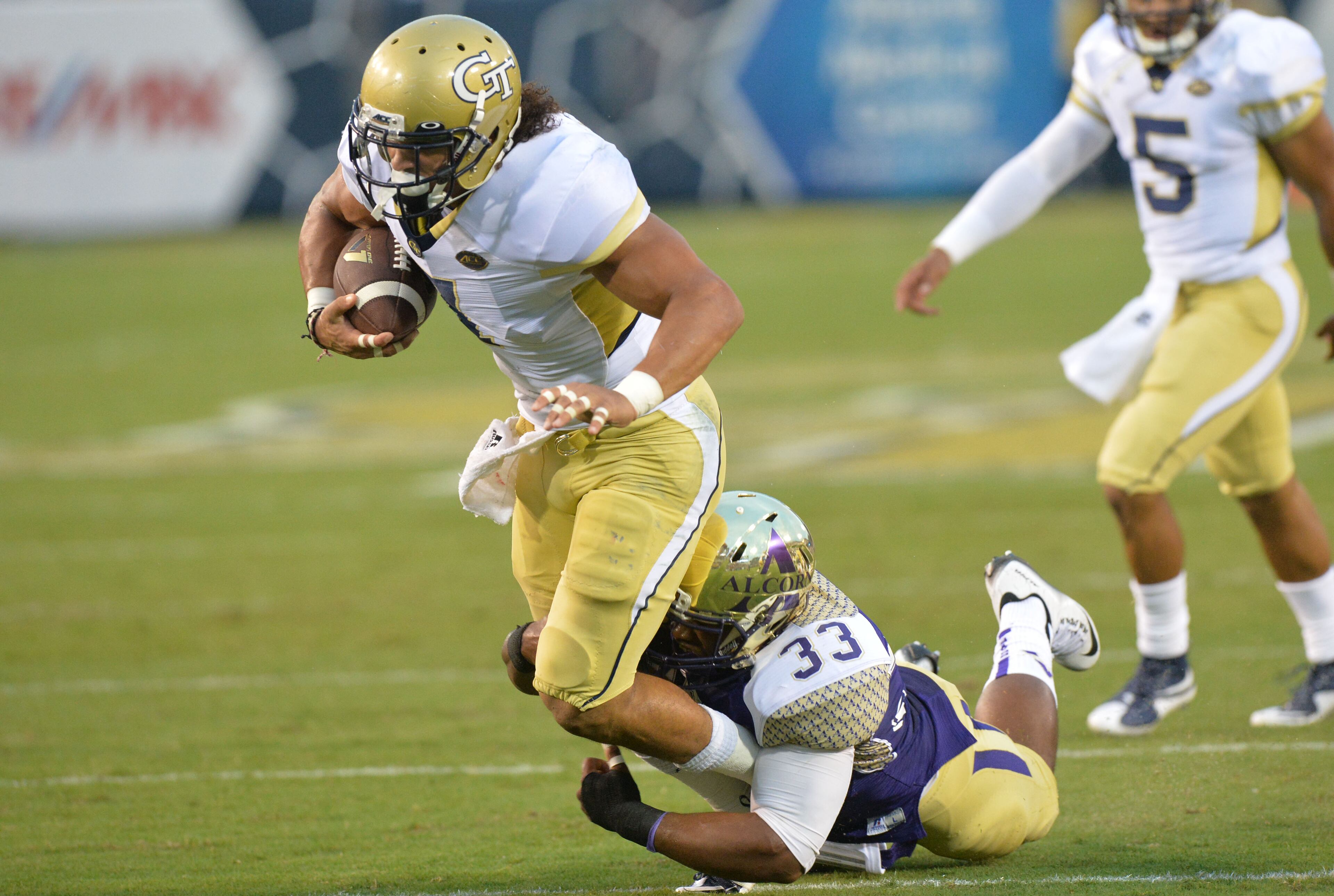 Georgia Tech's Patrick Skov (7) gets tackled by Alcorn State linebacker Damon Watkins (33) in the season opener at Bobby Dodd Stadium on Thursday, September 3, 2015. HYOSUB SHIN / HSHIN@AJC.COM