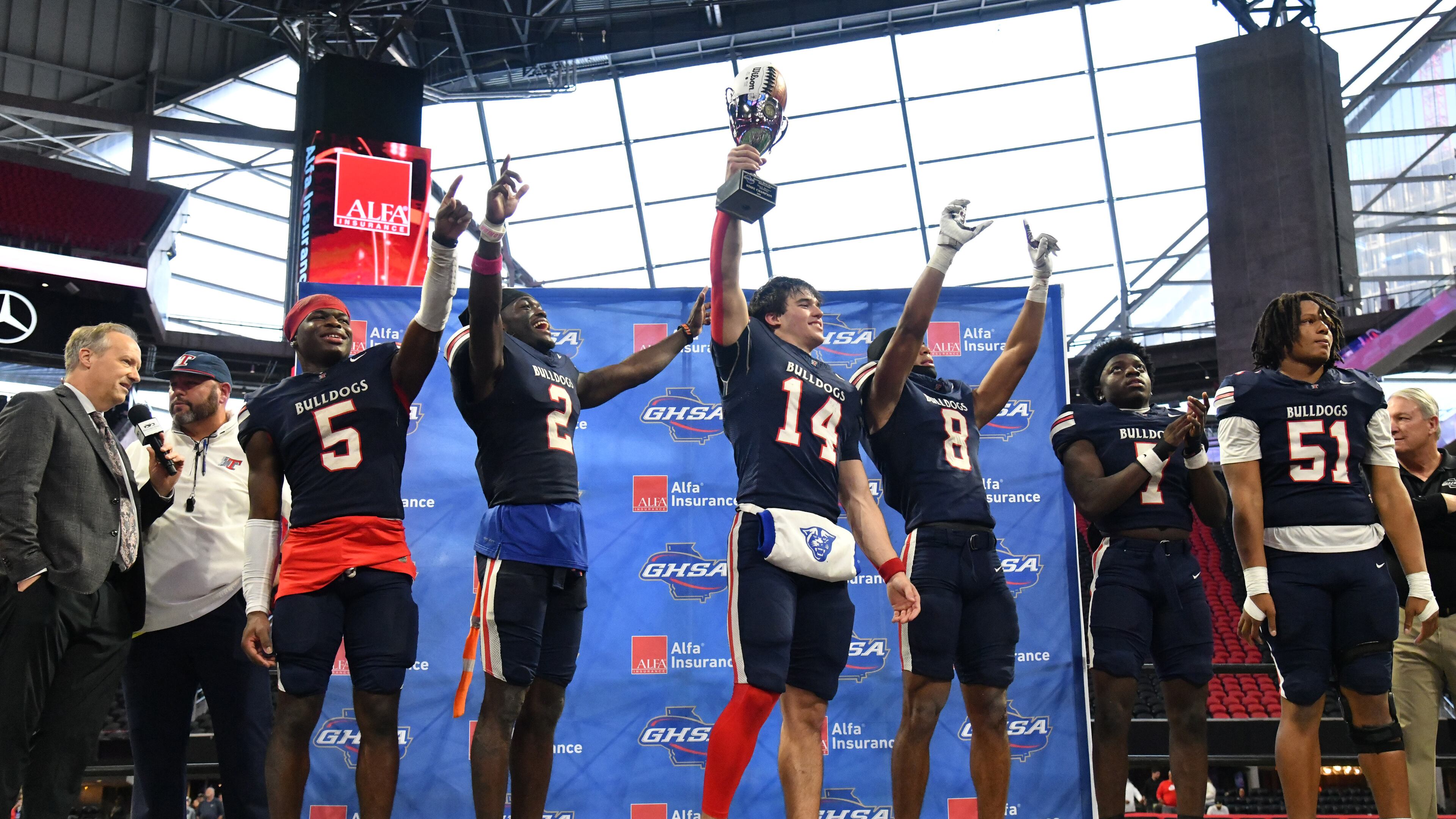 Toombs County, shown here celebrating their victory over Northeast Macon in the GHSA Class A Division I state championship game last year, is trying to reach the finals for the second season in a row. (Hyosub Shin/AJC 2024)