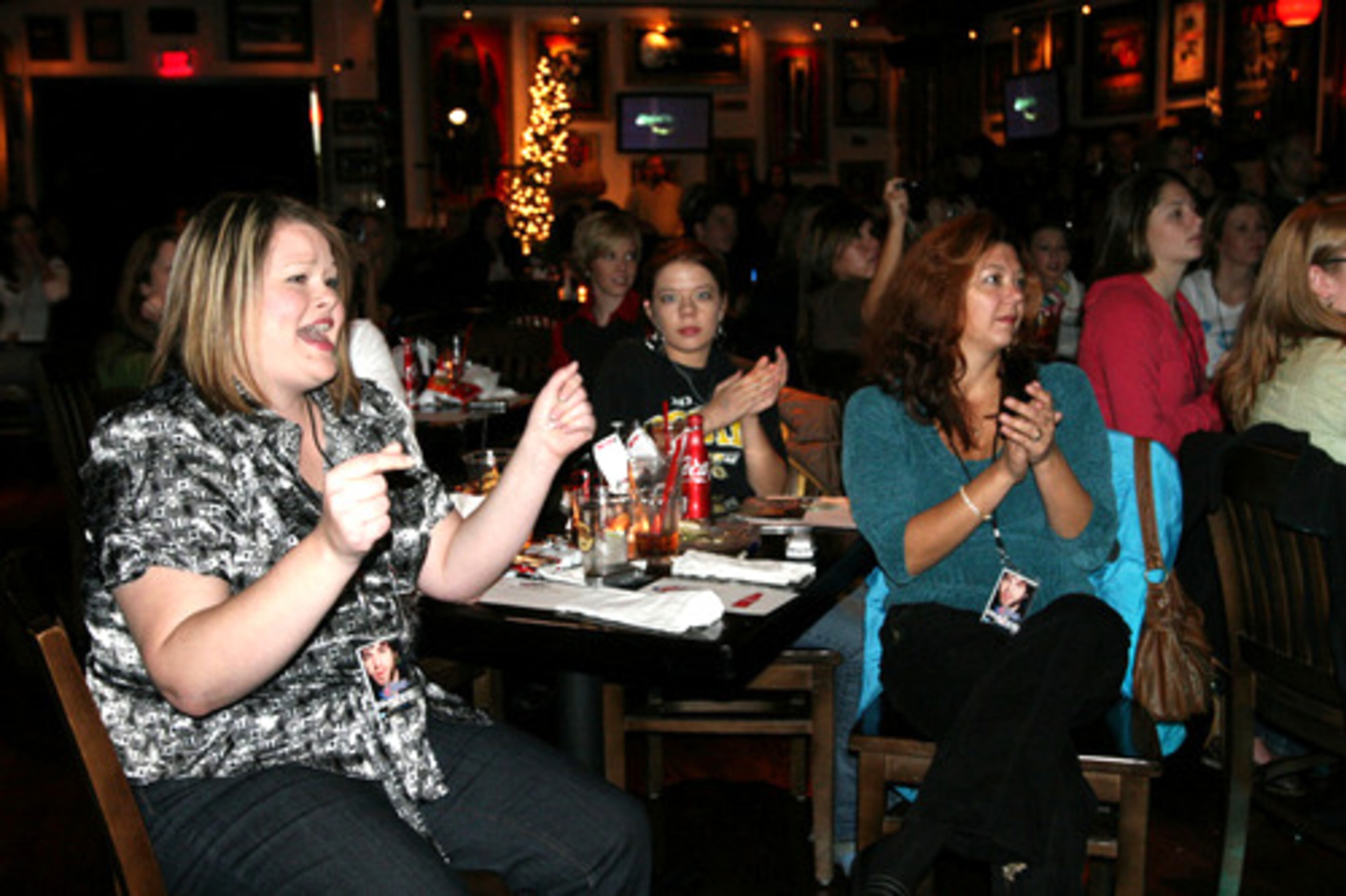 Cindy Bass of Duluth (left) cheers on Yamin.