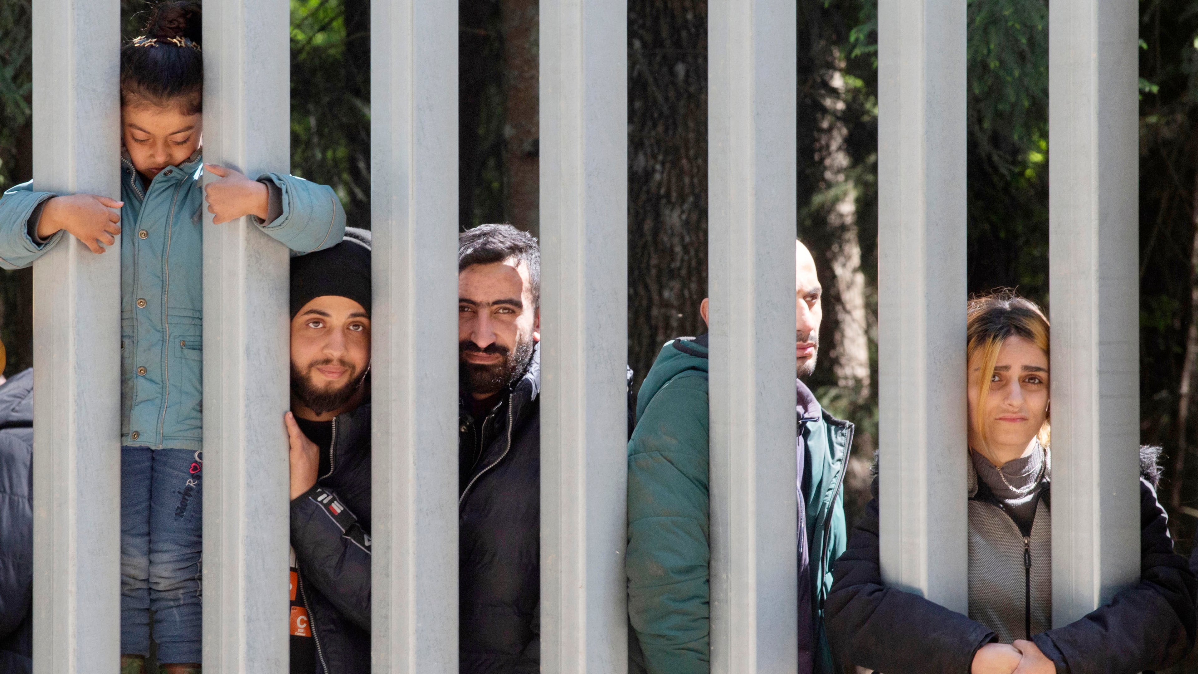 FILE - Members of a group of some 30 migrants seeking asylum are seen in Bialowieza, Poland, on May 28, 2023.. (AP Photo/Agnieszka Sadowska, File)