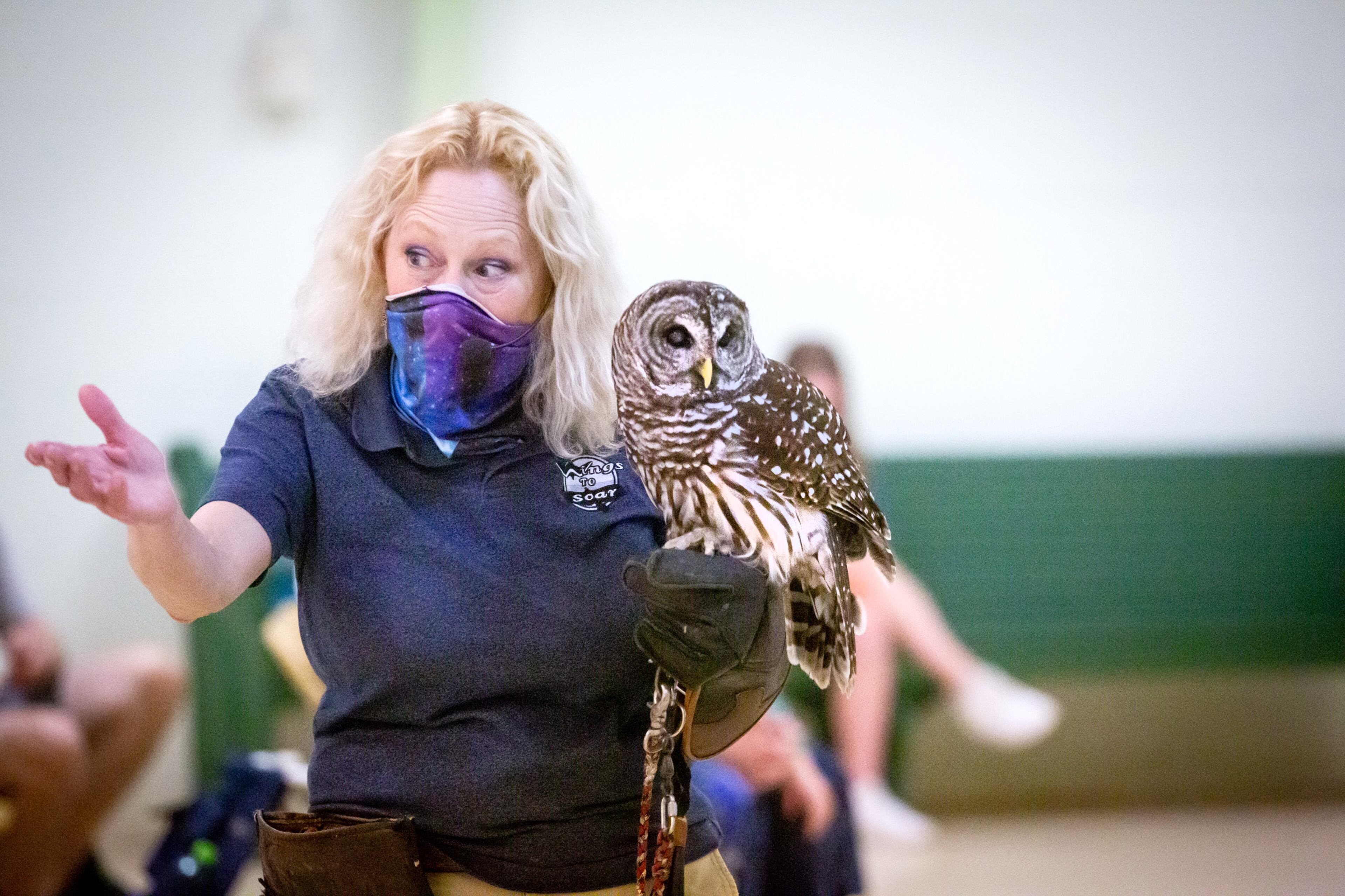 Co-director Dale Kernahan of Wings to Soar, a bird education program, holds a barred owl during a demonstration at the Chattahoochee Nature Center for its Family Fun Day: Flying into the Future on Sunday, March 14, 2021. (Photo: Steve Schaefer for The Atlanta Journal-Constitution)