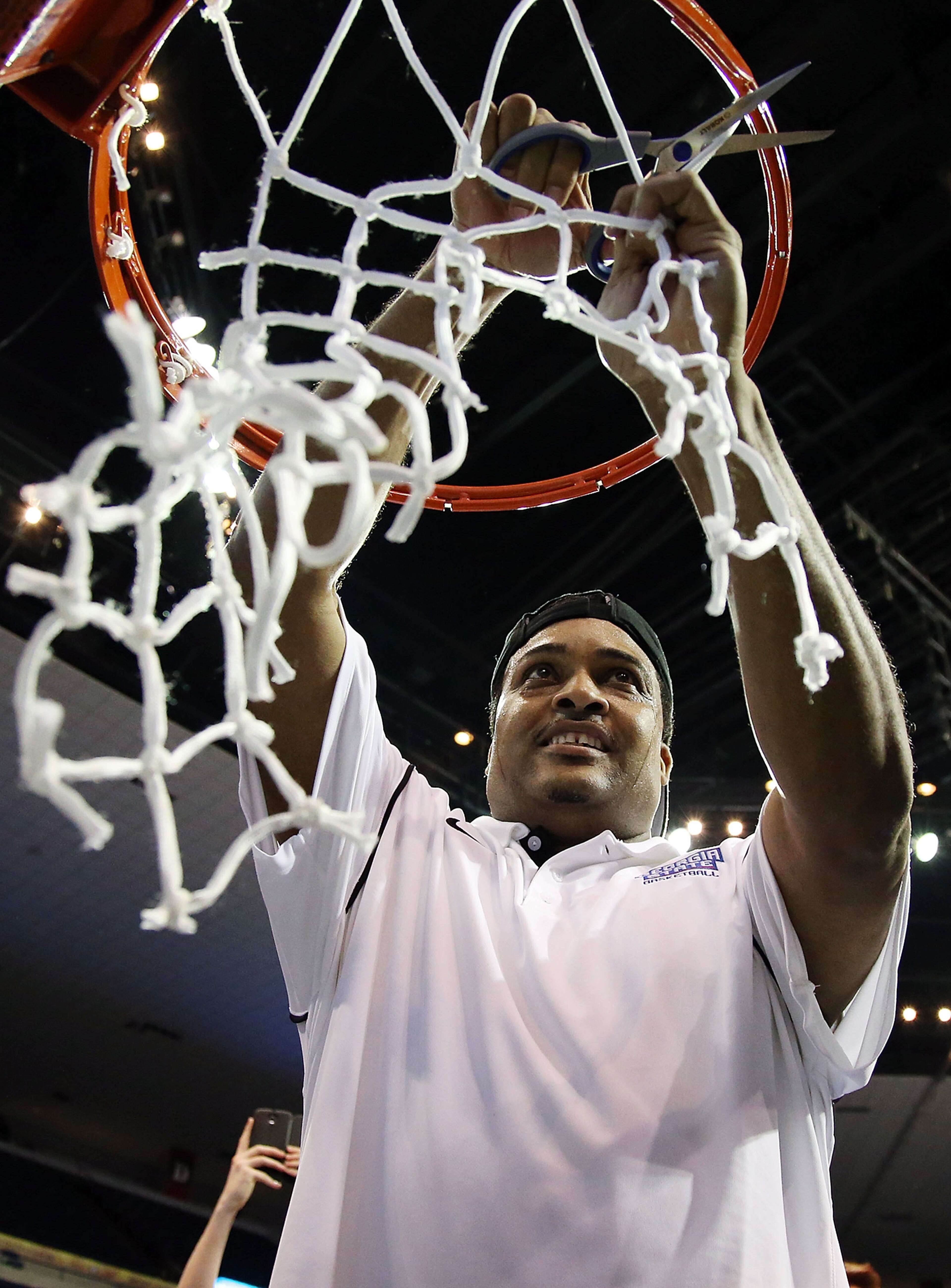 Ron Hunter cuts the net after defeating the Georgia Southern Eagles in the Sun Belt Conference championship game on March 15, 2015 in New Orleans, Louisiana. (Photo by Sean Gardner/Getty Images)