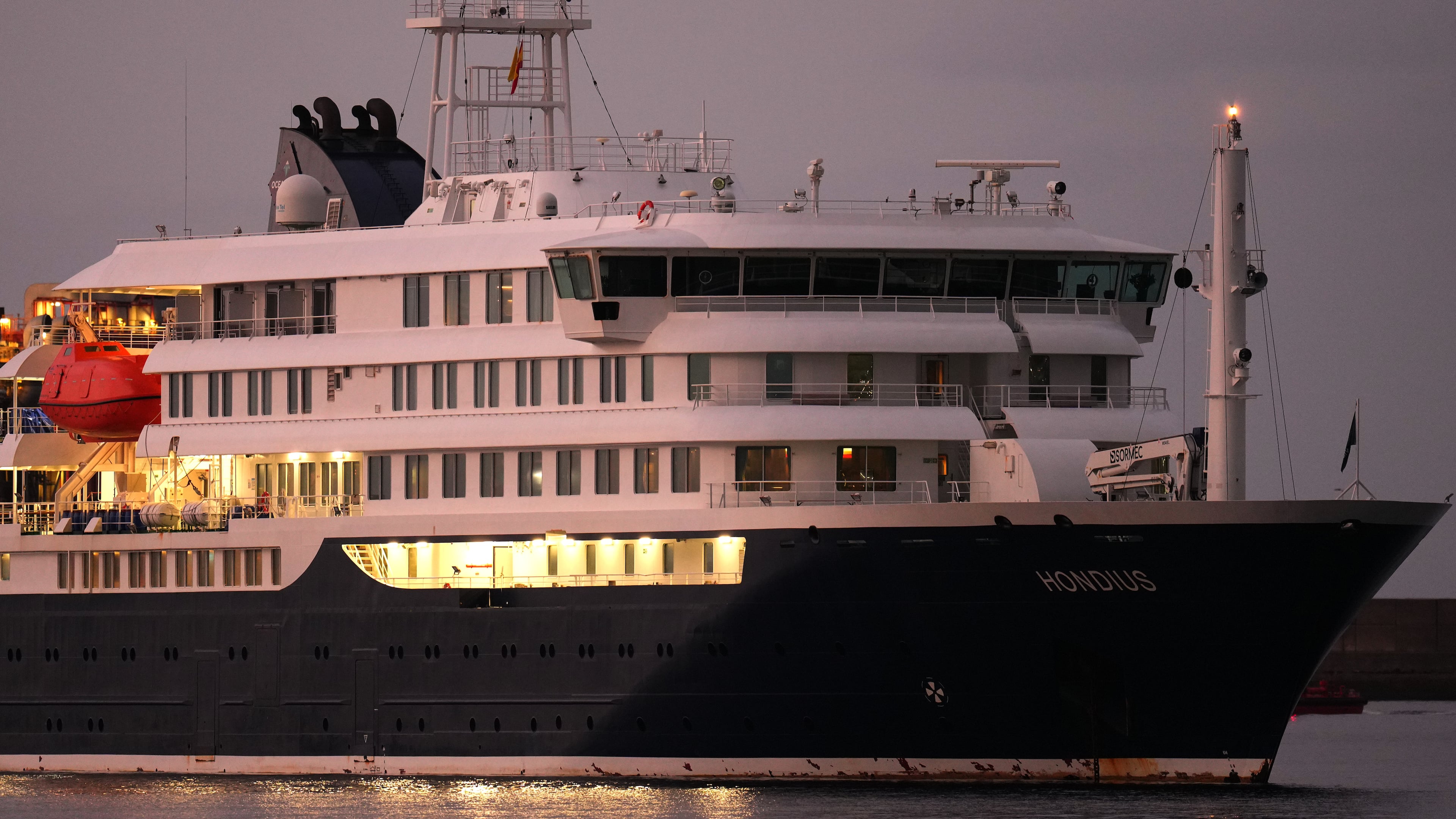 The hantavirus-stricken cruise ship MV Hondius is seen at anchor after arriving at the port of Granadilla in Tenerife, Canary Islands, Spain, Sunday, May 10, 2026. (AP Photo/Manu Fernandez)