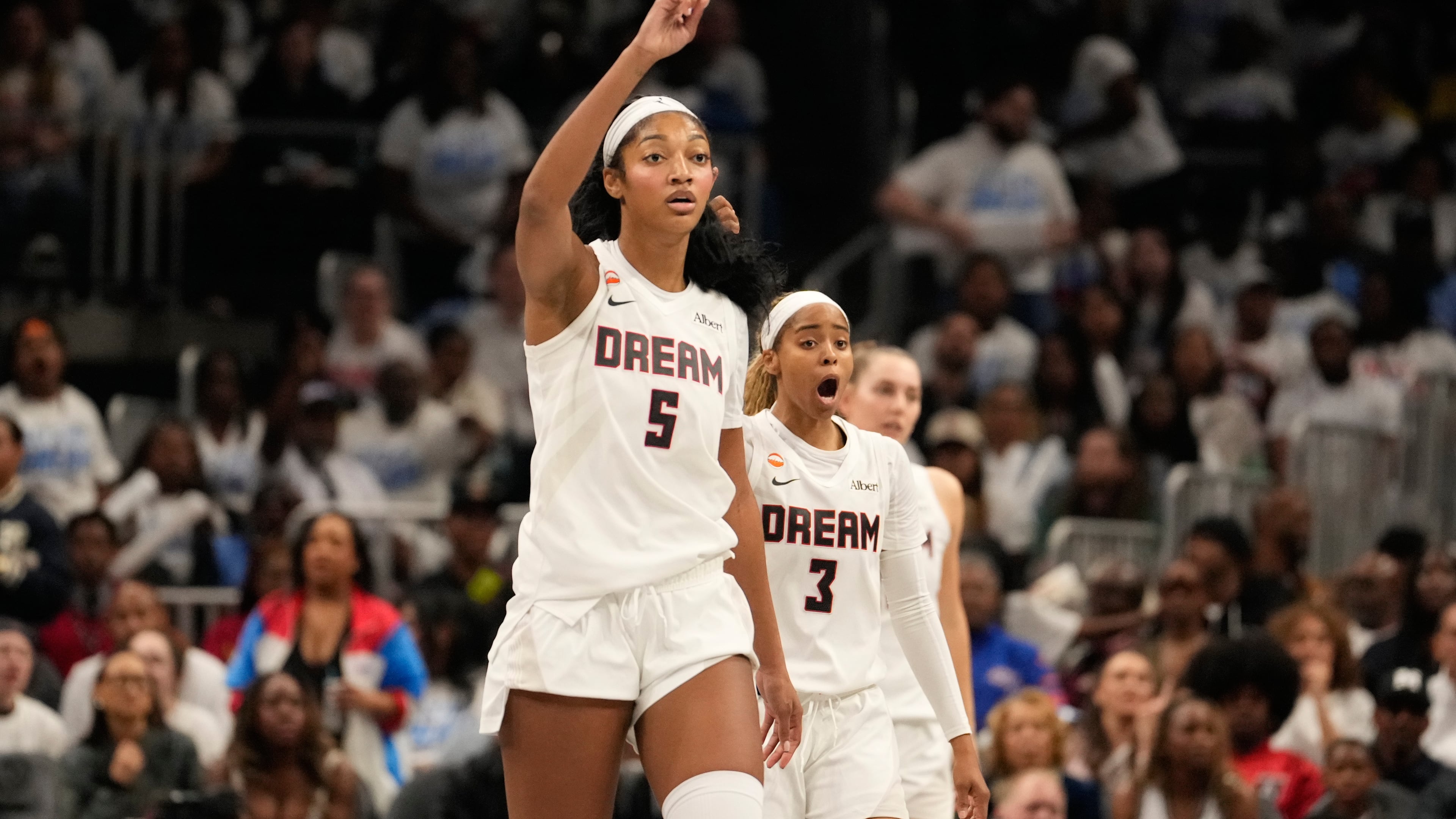 Atlanta Dream forward Angel Reese (5) and Atlanta Dream guard Jordin Canada (3) react to a foul in the second half during Game 4 of the WNBA basketball finals on Saturday, Oct. 24, 2026, in Atlanta. (AP Photo/Brynn Anderson)