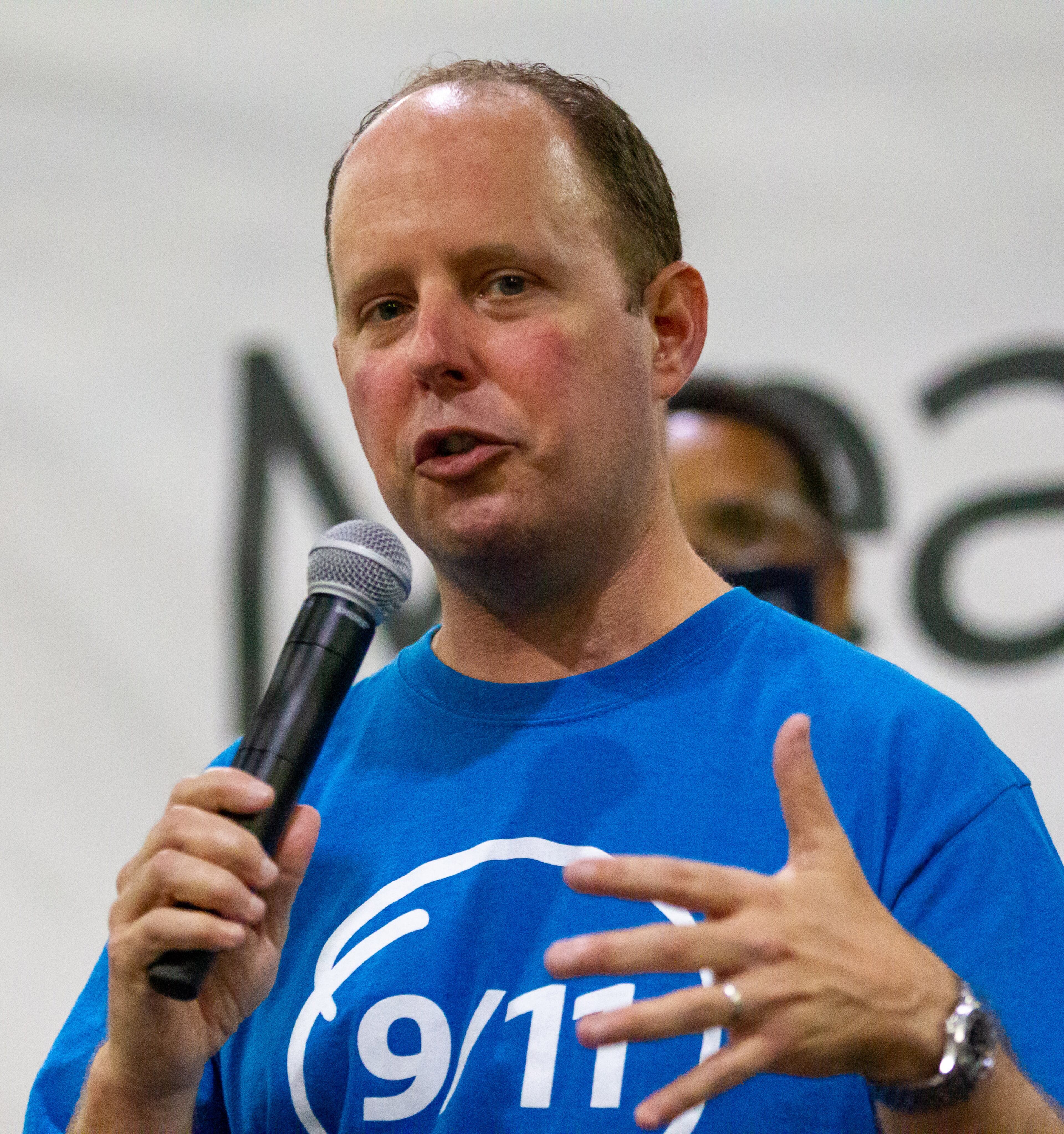 President and CEO of Hands On Atlanta Jay Cranman speaks to the volunteers during the opening ceremony of the 9/11 National Day of Service at the Georgia World Congress Center on Saturday, September 11, 2021. During the event, hundreds of volunteers packed meals for the Atlanta Community Food Bank. STEVE SCHAEFER FOR THE ATLANTA JOURNAL-CONSTITUTION