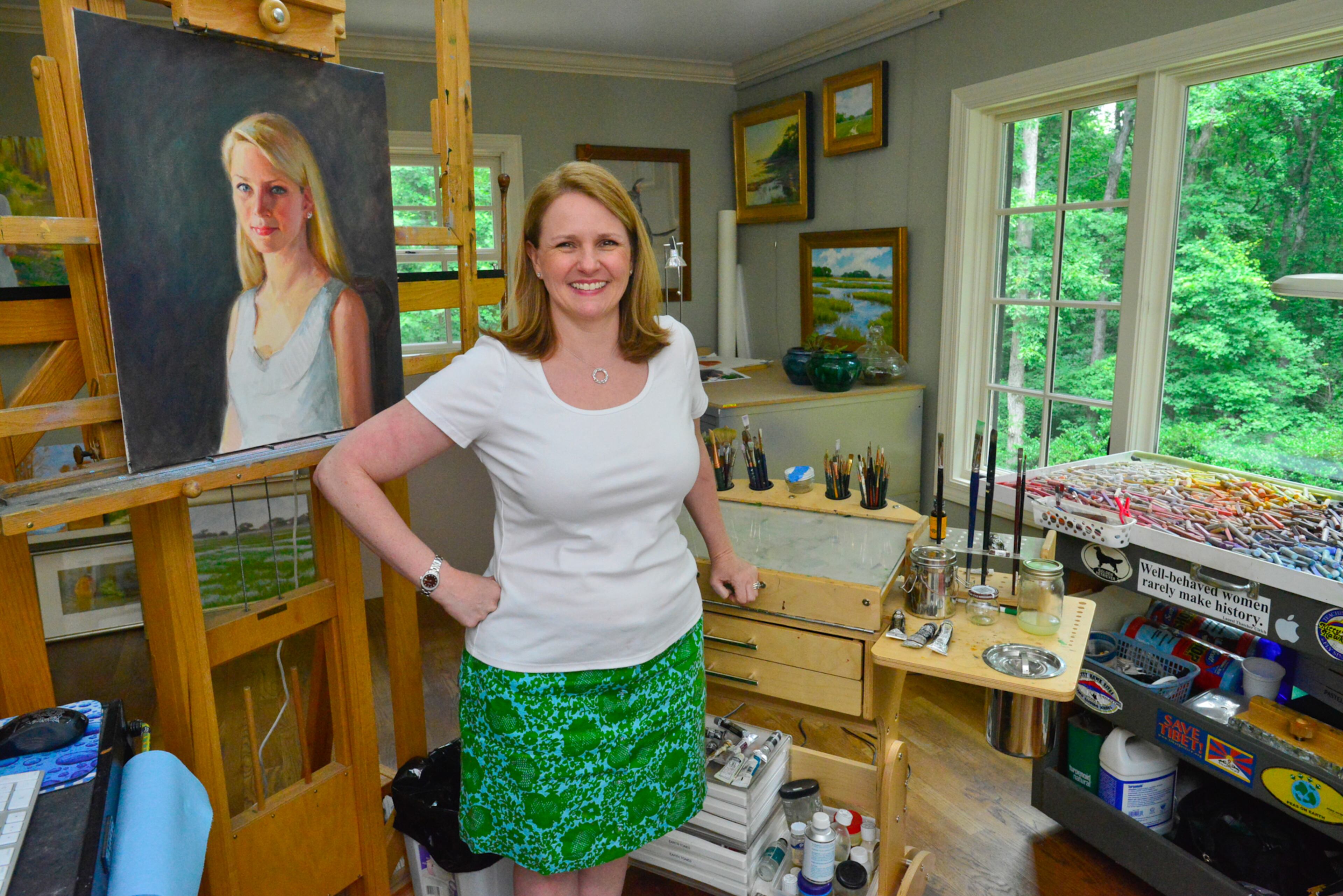 When Lisa Gleim-Jonas saw the den, she knew it was the perfect spot for her art studio, since she didn't want to paint in a basement or spare bedroom. The studio - formerly a den just off the family room - has room for her easel, computer, supplies and works in progress as owner of Lisa Gleim Fine Art Portraits. For the walls, she chose Sherwin-Williams' Sedate Gray.
