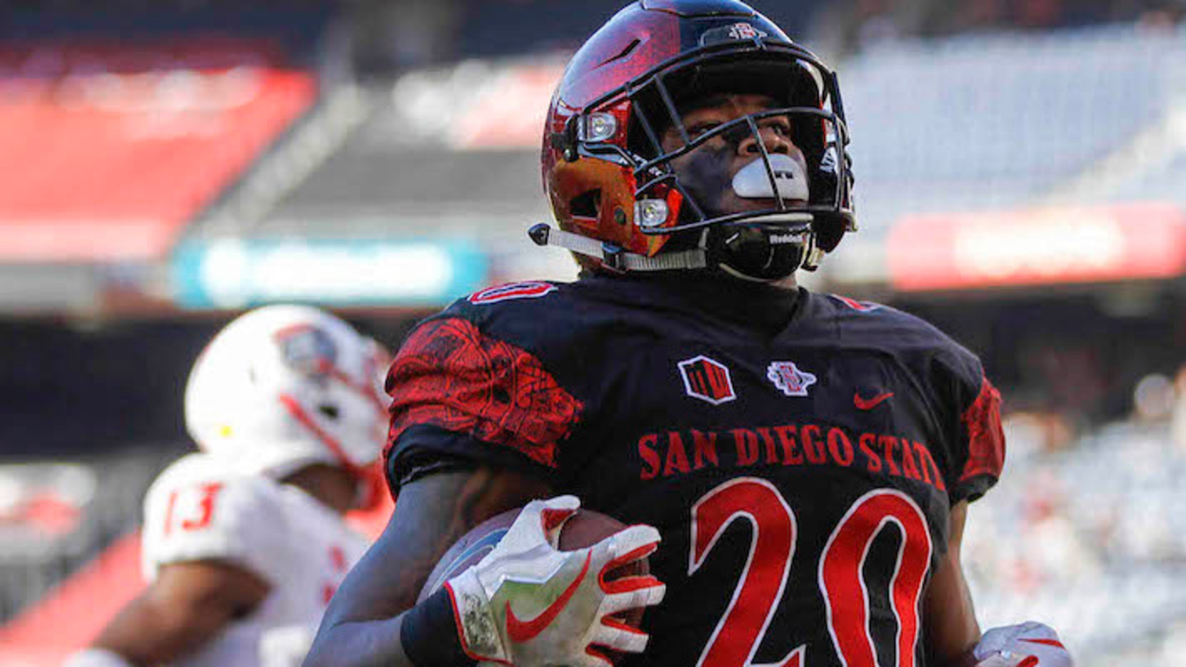 San Diego State running back Rashaad Penny carries the ball for a 51-yard touchdown run against New Mexico at SDCCU Stadium in San Diego on November 24, 2017. (Hayne Palmour IV/San Diego Union-Tribune/TNS)