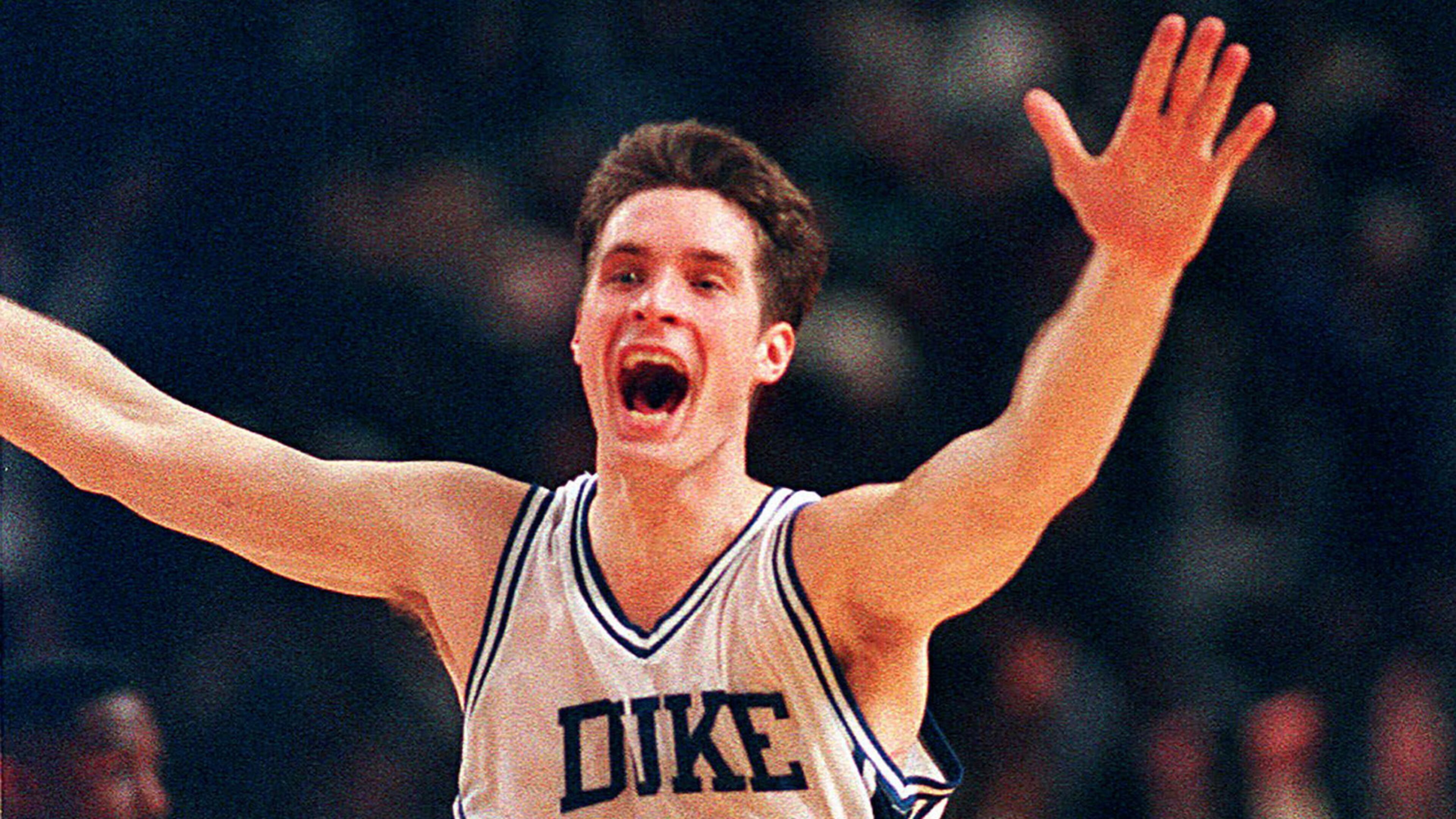 Duke's Christian Laettner runs down the court after making the last second, game-winning shot to defeat Kentucky 104-103 in overtime March 28, 1992, in the East Regional NCAA final in Philadelphia.
