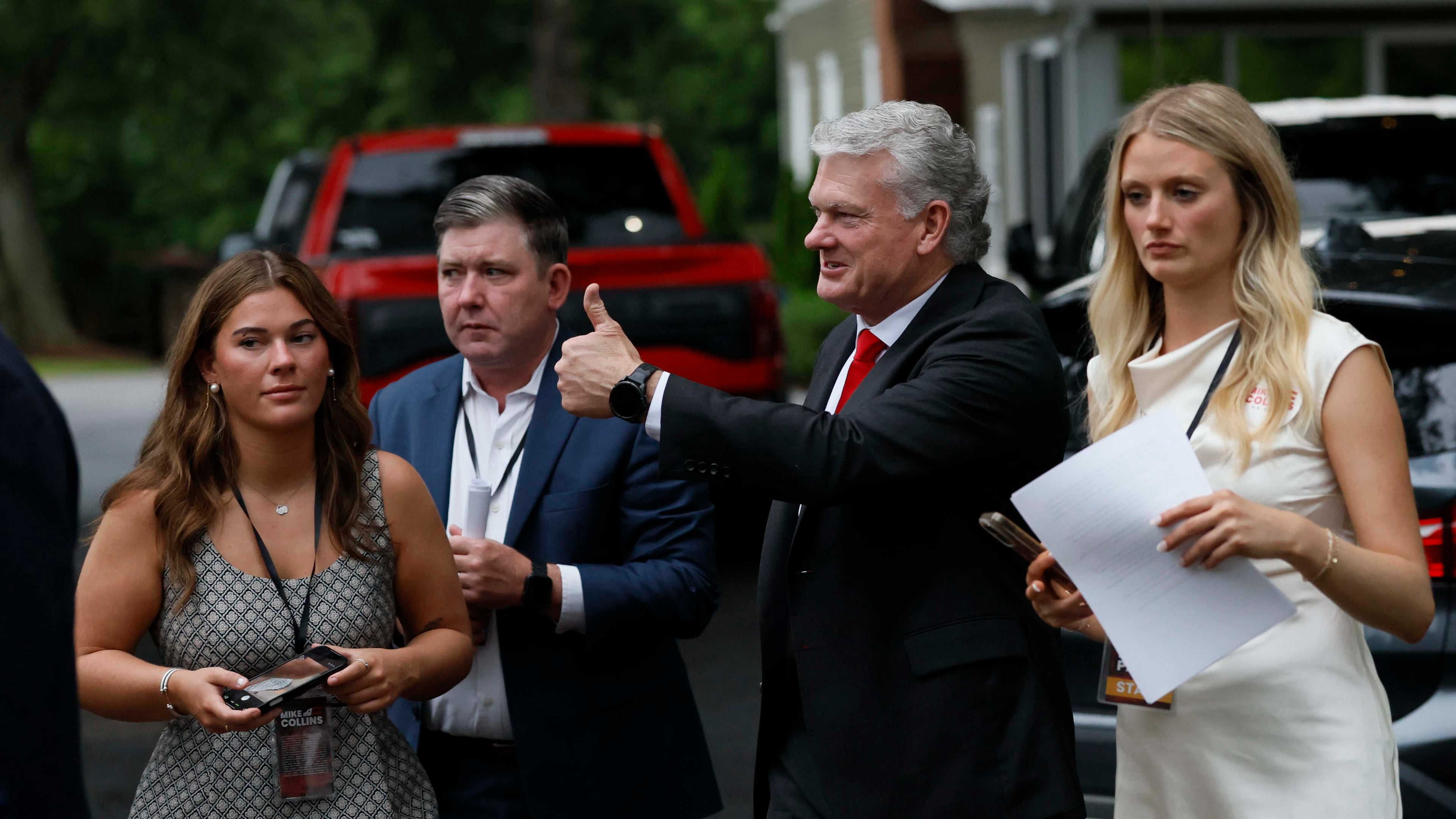 U.S. Rep. Mike Collins gives a thumbs up as he arrives at his runoff election watch party at Seven Oaks Manor in Jackson, Ga., on Tuesday, June 16, 2026. (Miguel Martinez/AJC)