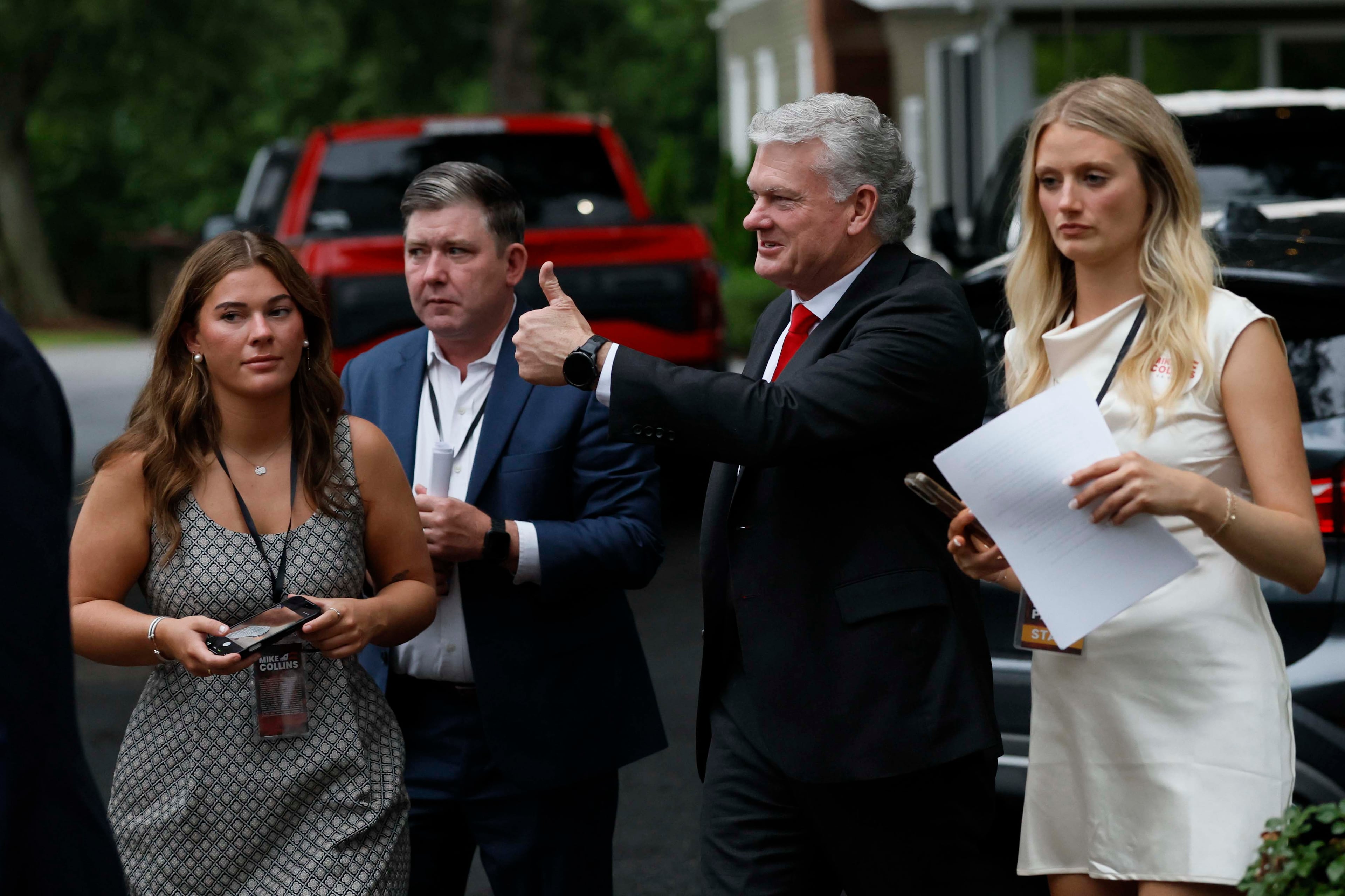 U.S. Rep. Mike Collins gives a thumbs up as he arrives at his runoff election watch party at Seven Oaks Manor in Jackson, Ga., on Tuesday, June 16, 2026. (Miguel Martinez/AJC)