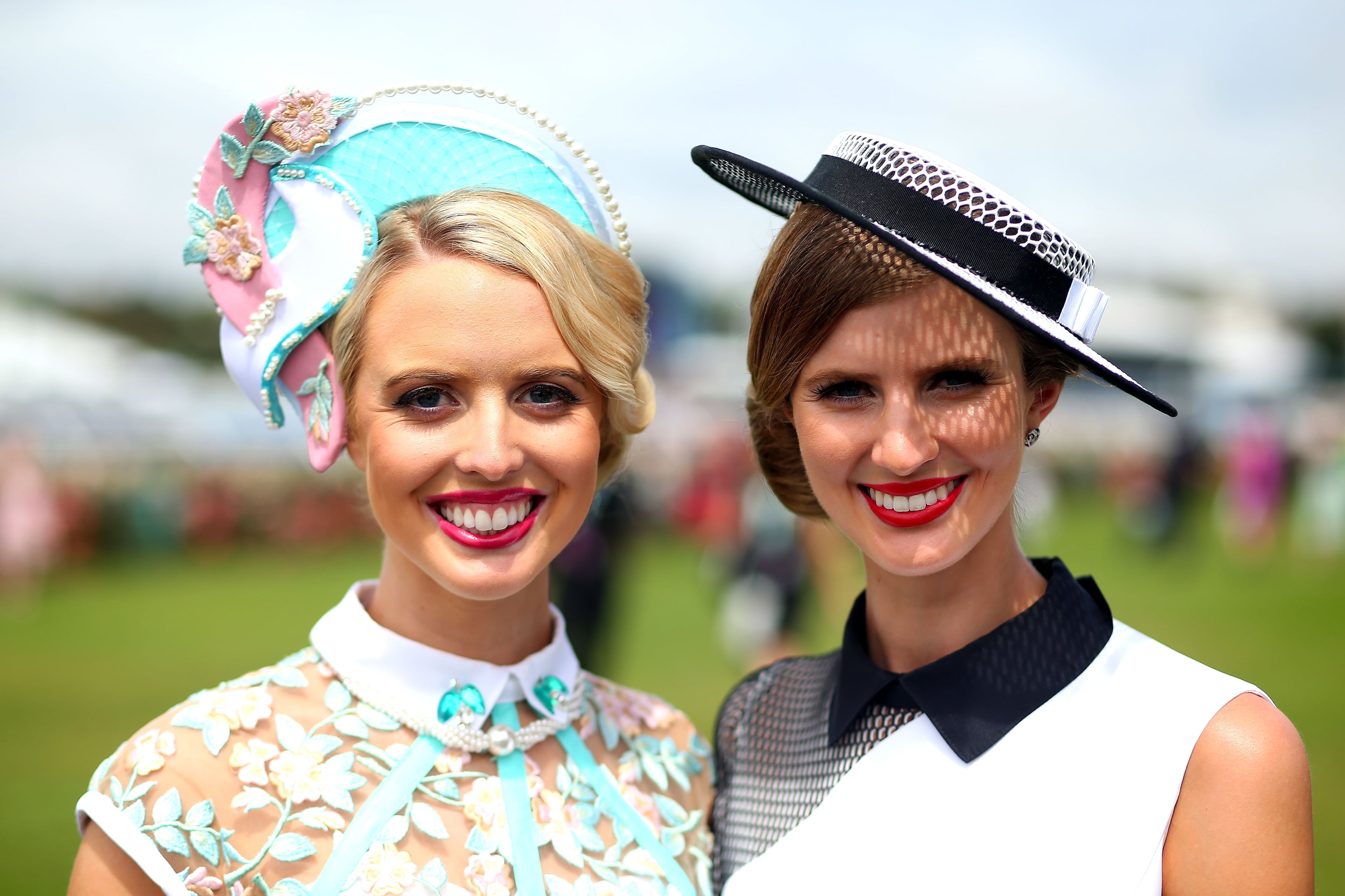 MELBOURNE, AUSTRALIA - NOVEMBER 05: Racegoers pose on Crown Oaks Day at Flemington Racecourse on November 5, 2015 in Melbourne, Australia. (Photo by Graham Denholm/Getty Images for the VRC)
