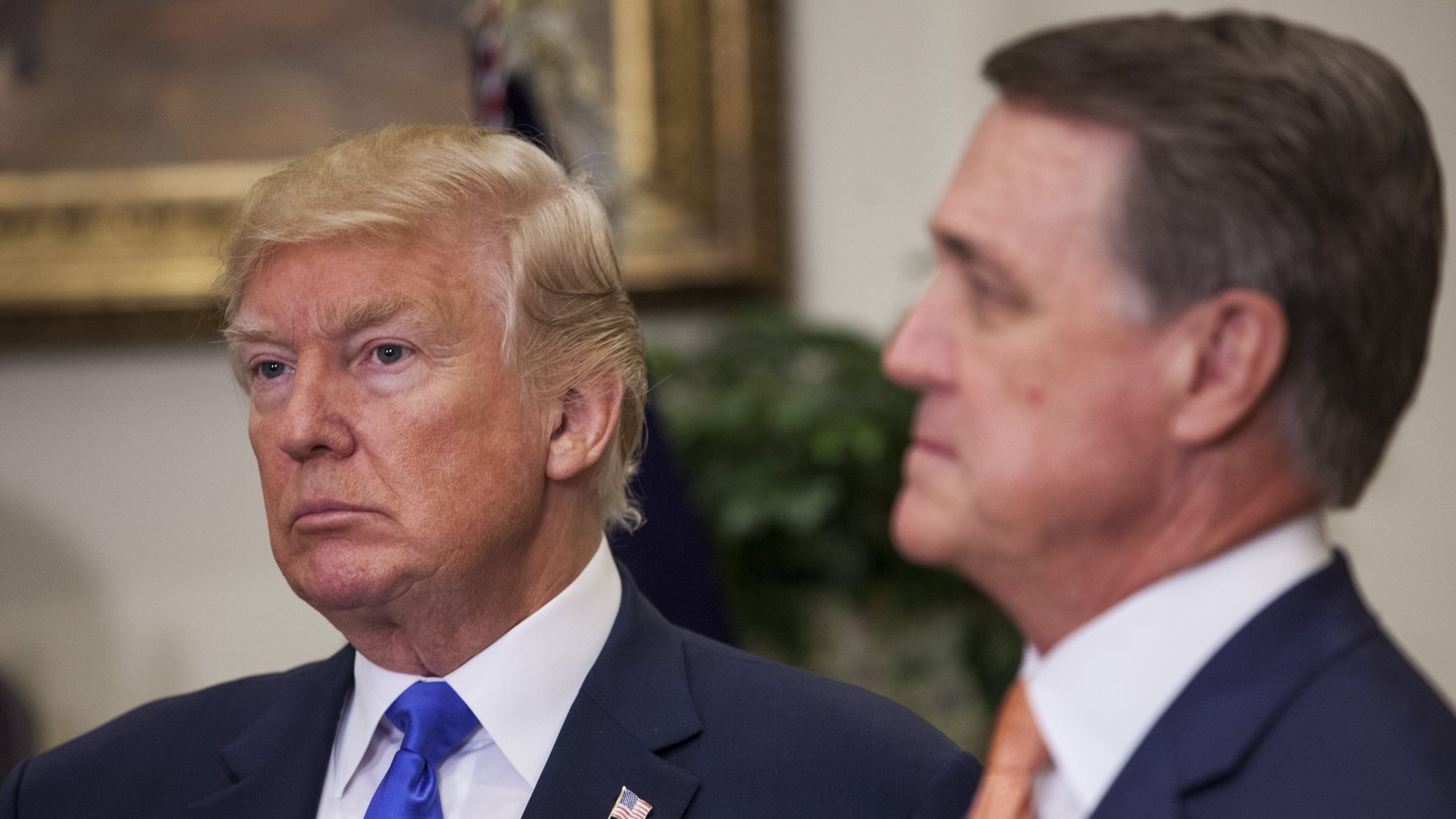 President Donald Trump, left, and U.S. Sen. David Perdue first met five years ago and worked closely since Trump took office in 2017. Perdue, who is up for re-election next year, plays up the connection on the campaign trail. “He calls me early in the morning and late at night. I spend time with him in the White House. Sometimes he’s exhausting, guys, but he works,” Perdue said of Trump at a recent gathering of religious conservatives. His opponents are also trying to tie him to the president. Photo by: Zach Gibson/picture-alliance/dpa/AP Images