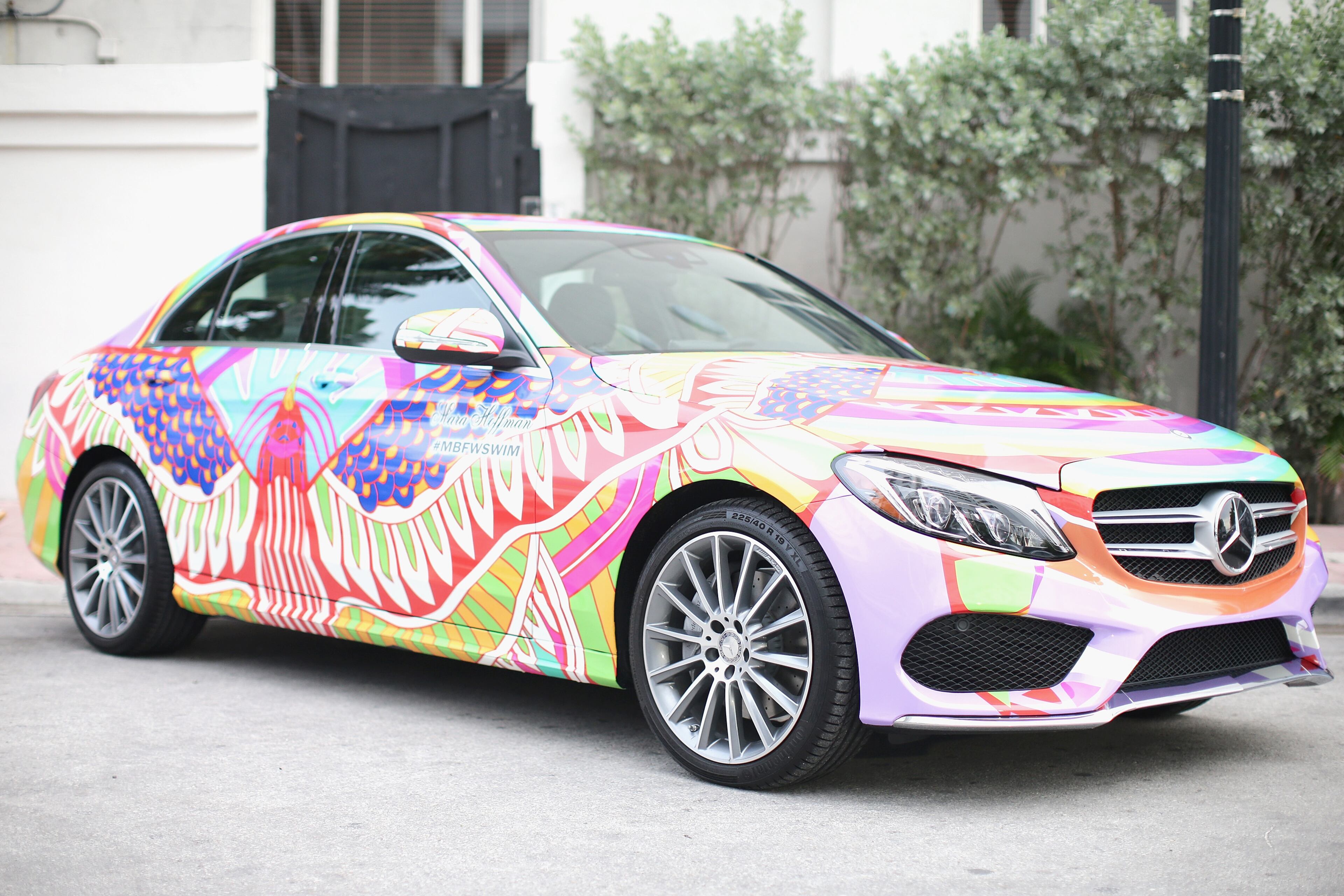 MIAMI BEACH, FL - JULY 17: A 2015 Mercedes-Benz C-Class featuring an exclusive design by Mara Hoffman on display during Mercedes-Benz Fashion Week Swim 2015 at The Raleigh on July 17, 2014 in Miami Beach, Florida. (Photo by Neilson Barnard/Getty Images for Mercedes-Benz Fashion Week )