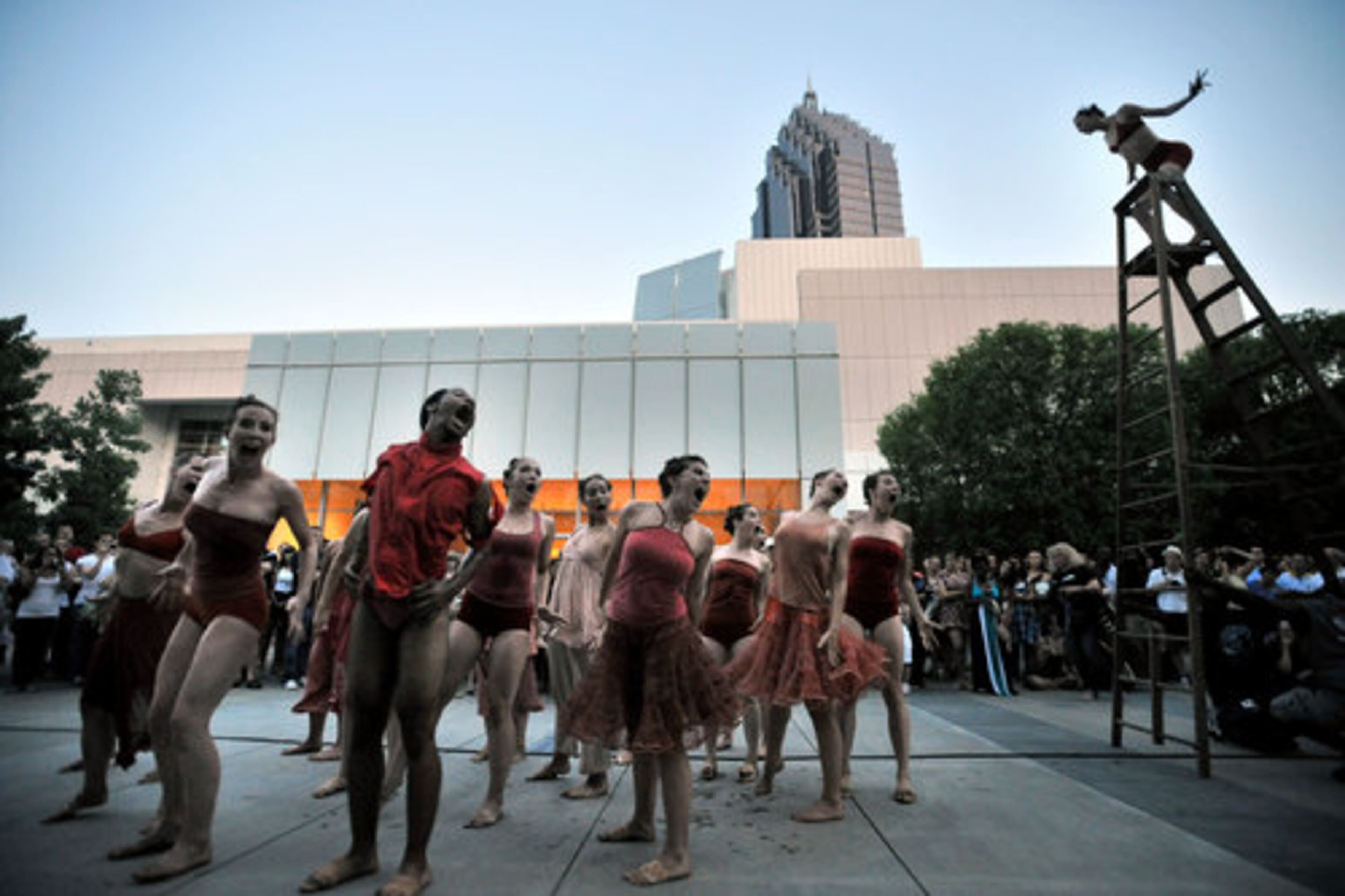 Artists perform "Sculpting Ground" during Roem.