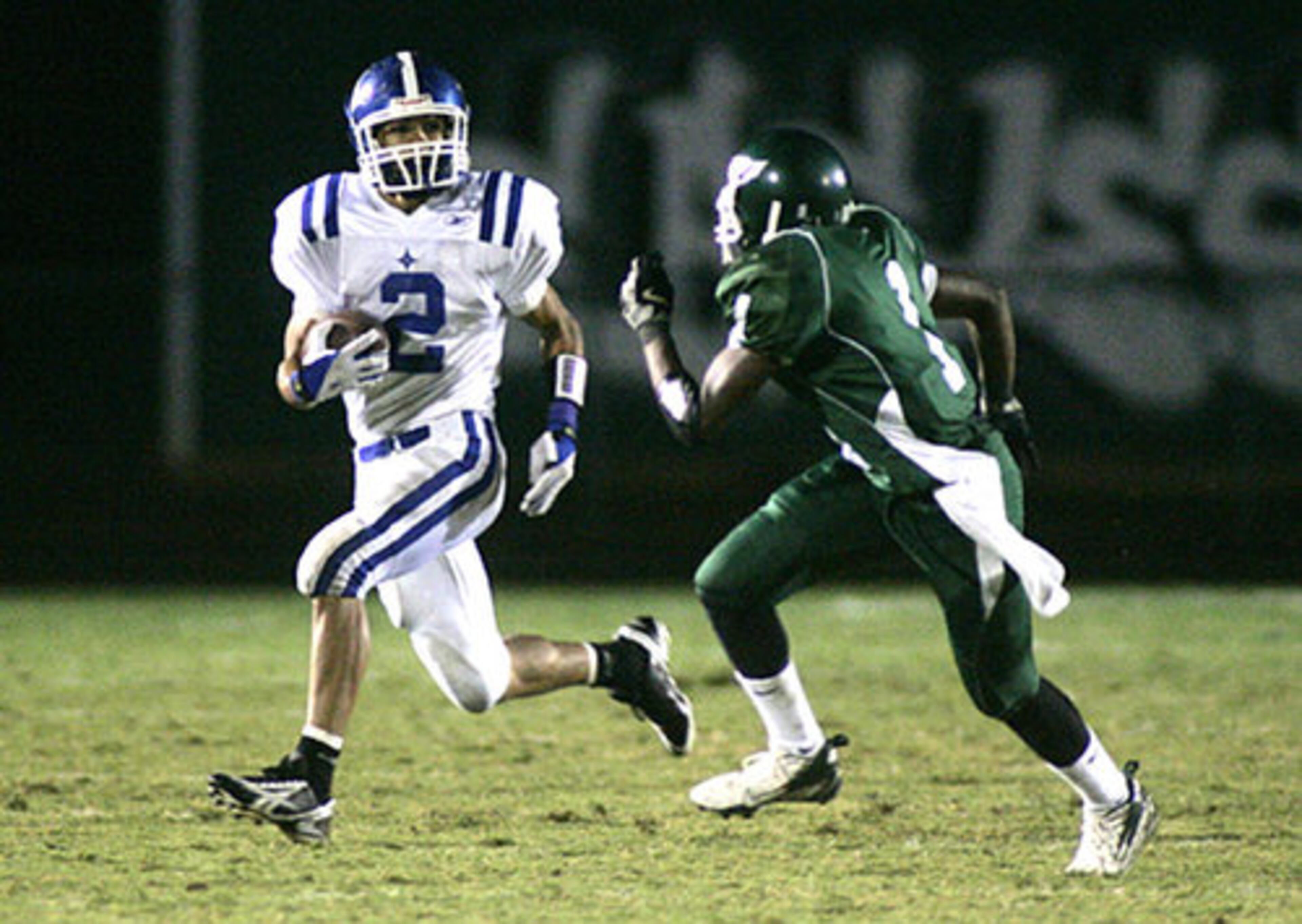 Peachtree Ridge Brandon Stanley (2) prepares to put a move on Collins Hill's Destry Berry.
