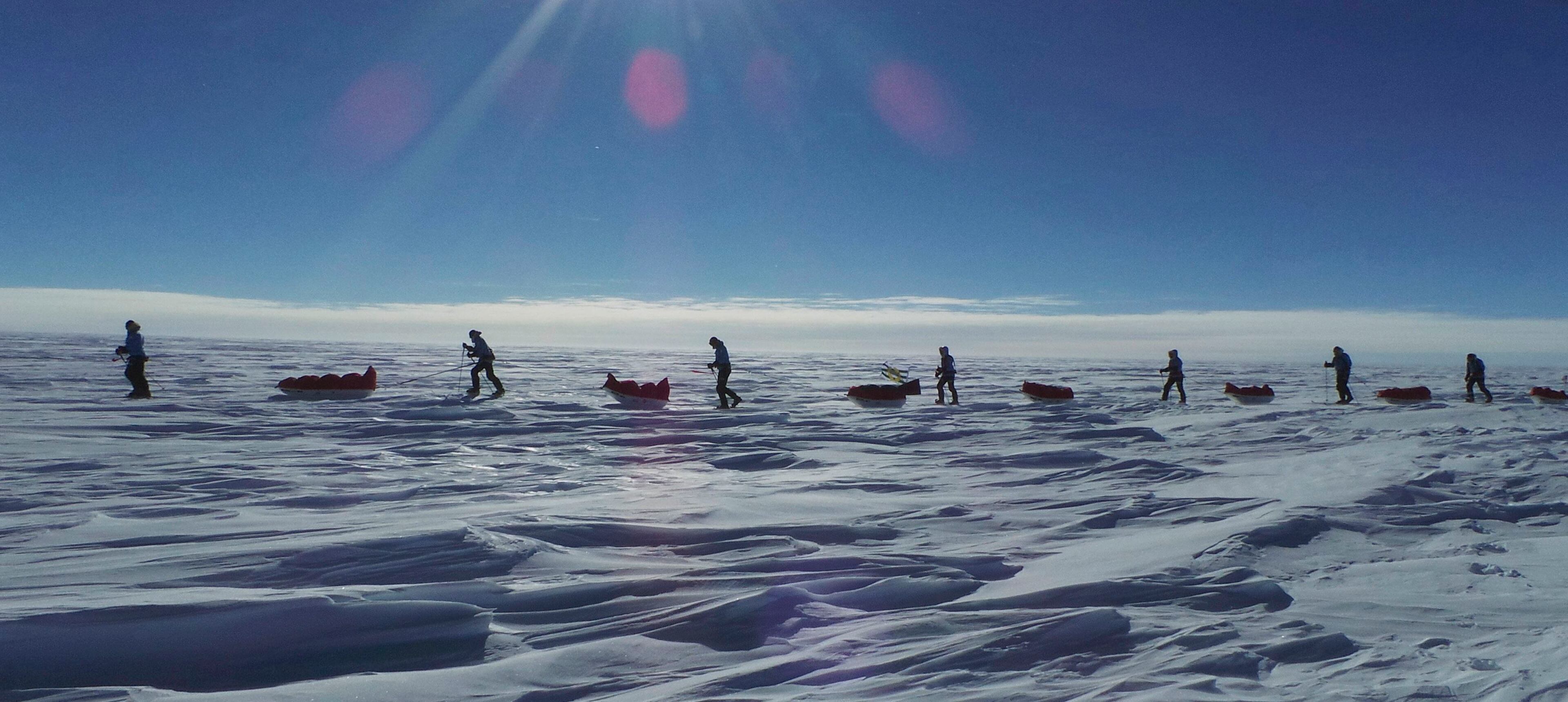 Team US trek on the first day of the Virgin Money South Pole Allied Challenge 2013 expedition in Antarctica December 1, 2013. Prince Harry set off on Sunday on his 300 kilometre (186 miles) walk to the South Pole for the charity Walking With The Wounded (WWTW) to raise money for wounded servicemen and women. The Virgin Money South Pole Allied Challenge 2013, of which Harry is patron, will see the participants race across three degrees to the South Pole. All 12 injured service personnel from Britain, America, Canada and Australia have overcome life-changing injuries and undertaken challenging training programmes to prepare themselves for the conditions they will face in Antarctica. Trekking around up to 20km (12 miles) per day, the teams will endure temperatures as low as minus 45 centigrades (minus 113 Fahrenheit) and 80 kph (50 mph) winds as they pull their 70 kg (154 pound) sleds, known as pulks, towards the southernmost point on the globe. Picture taken December 1, 2013. REUTERS/Victoria Nicholson/Walking With the Wounded