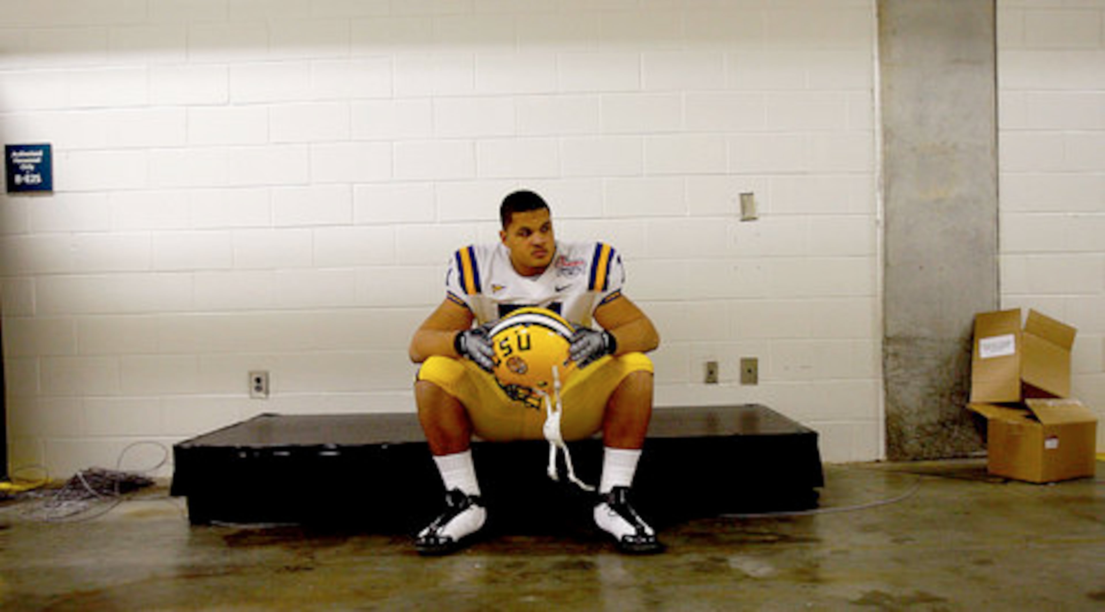 LSU freshman defensive tackle Cordian Hagans, who played at Northview High School in Duluth, takes a quiet moment in the belly of the Georgia Dome before taking the field.