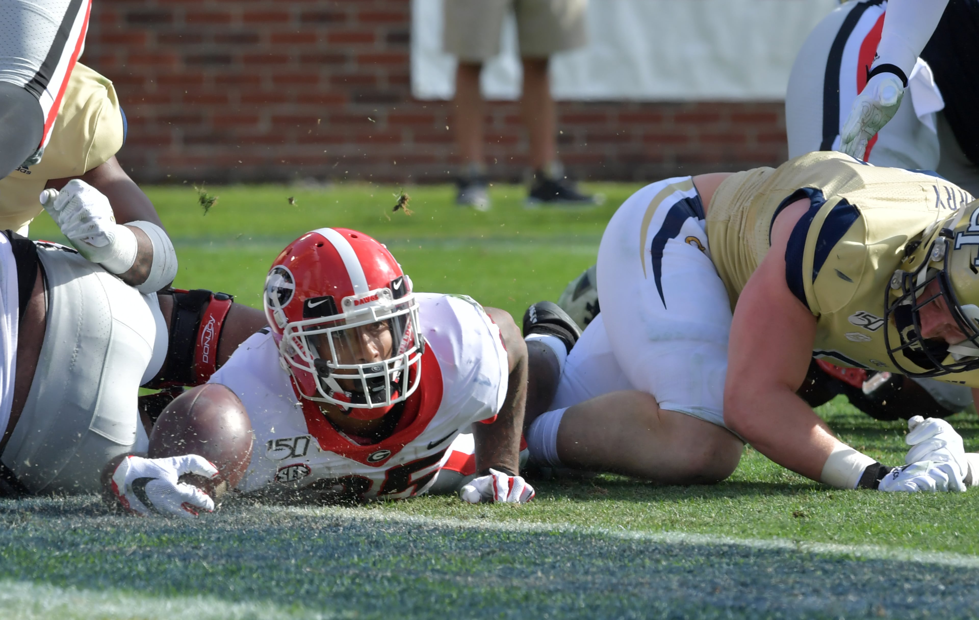 Georgia running back Brian Herrien (35) scores a touchdown during the first half of an NCAA college football game at Bobby Dodd Stadium on Saturday, November 30, 2019. (Hyosub Shin / Hyosub.Shin@ajc.com)