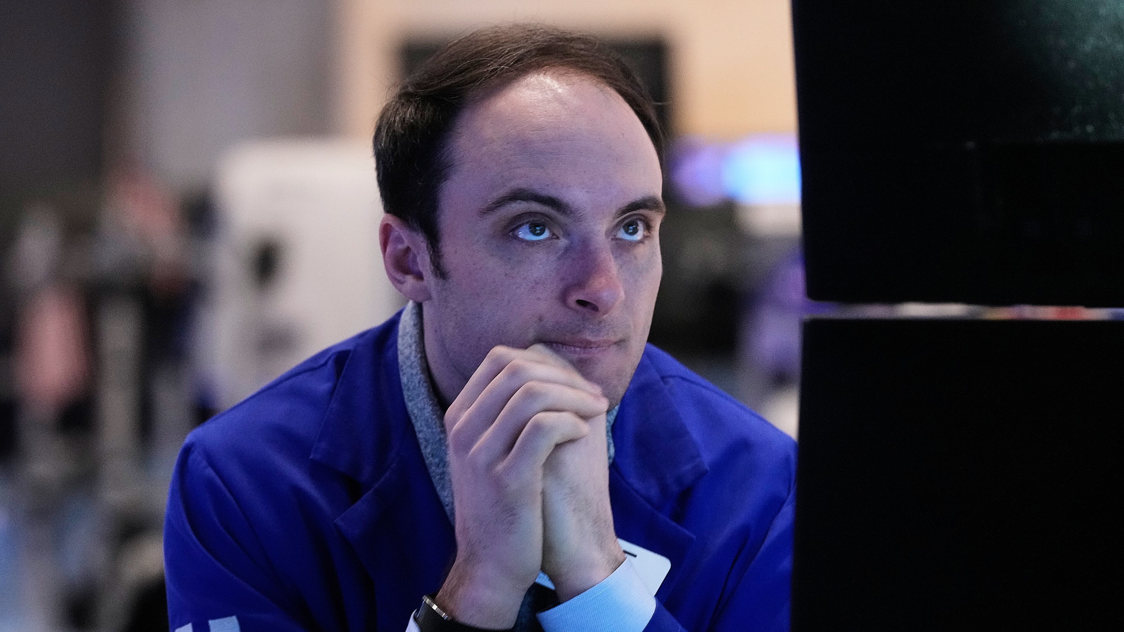 Specialist Joseph Maguire works at his post on the floor of the New York Stock Exchange, Tuesday, Feb. 3, 2026. (AP Photo/Richard Drew)