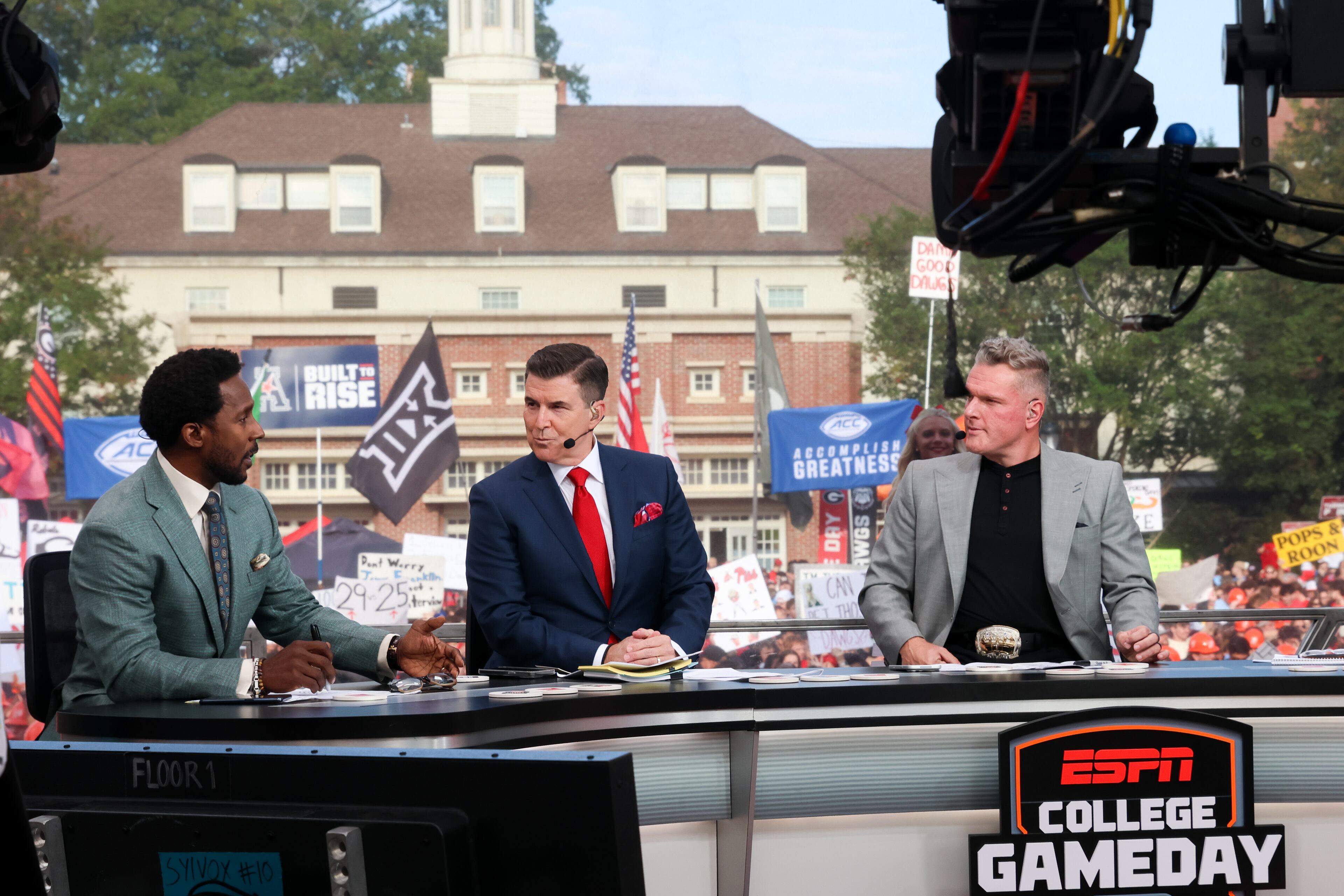 From left, Desmond Howard, host Rece Davis, and Pat McAfee talk football during the ESPN College GameDay broadcast from Myers Quad at UGA on Saturday, Oct. 18, 2025. (C.J. Bartunek for the AJC)