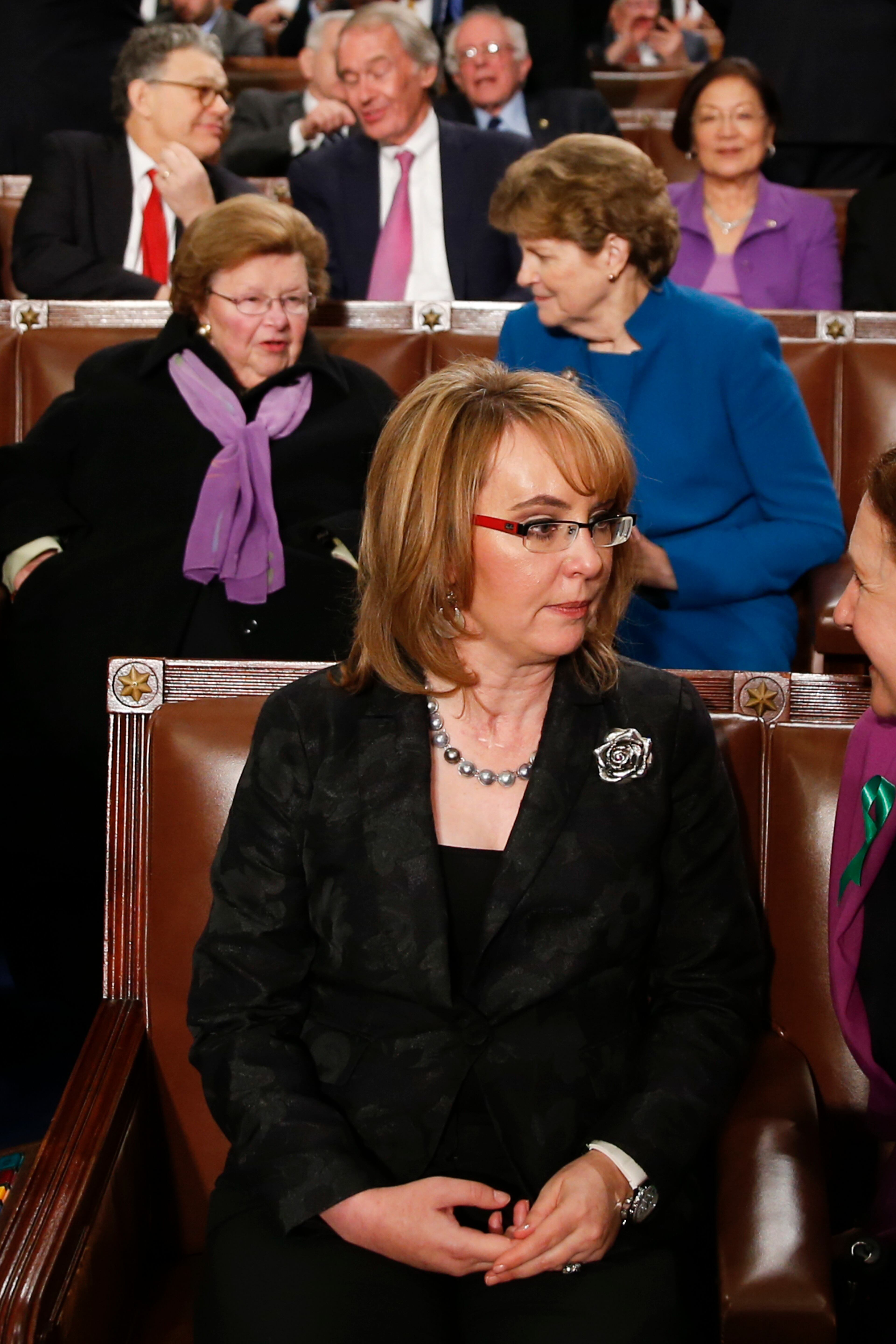 Former Rep. Gabby Giffords, D-Ariz., sits in the House chamber before President Barack Obama delivers the State of the Union address to a joint session of Congress on Capitol Hill in Washington, Tuesday, Jan. 12, 2016. (AP Photo/Evan Vucci)
