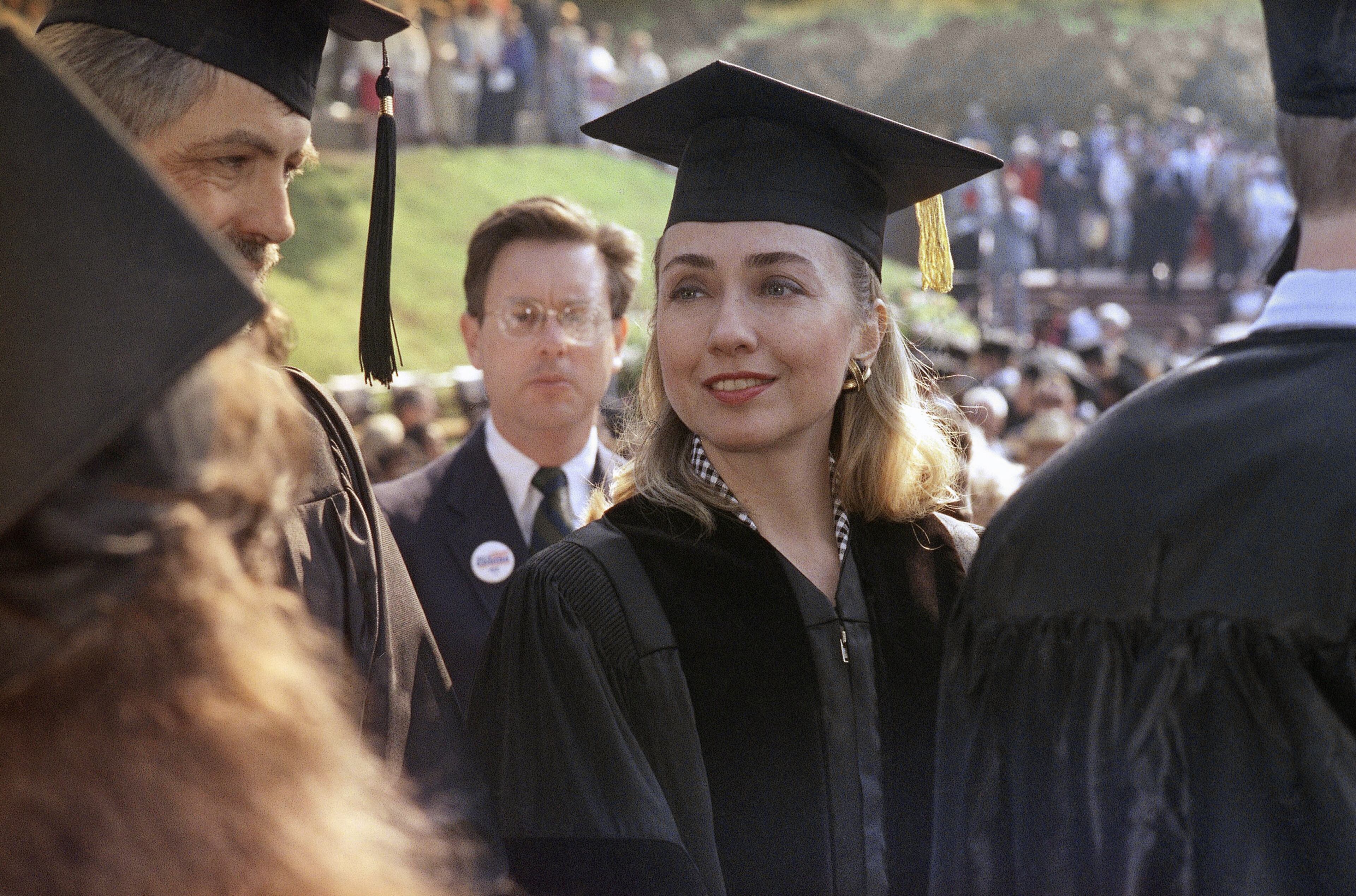 In this May 30, 1992, file photo, Hillary Rodham Clinton receives honorary doctor of laws degree from Hendrix College in Conway, Ark. As a young girl growing up in suburban Chicago, Hillary Rodham decided she’d never change her last name _ no matter who she ended up marrying. Three decades later, an entire state debated her childhood choice. Arkansans grumbled about invitations to public events from Gov. Bill Clinton and Hillary Rodham. Chelsea Clinton’s birth announcement, featuring the two names, became a hot topic of conversation around the state. Today, they hear from Hillary Clinton. That’s the name aides to the front-runner for the Democratic presidential nomination say she now prefers. (AP Photo/Chris Ocken, File)