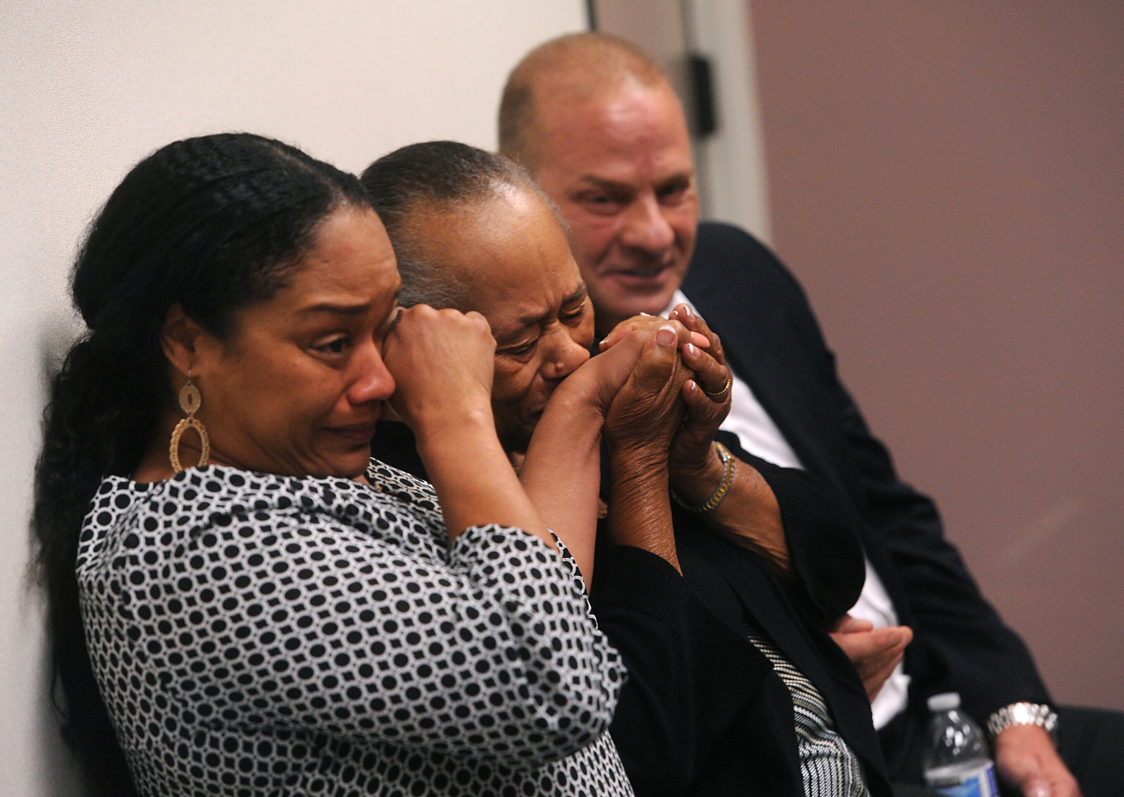 LOVELOCK, NV - JULY 20: O.J. Simpson's sister Shirley Baker, middle, daughter Arielle Simpson, left, and friend Tom Scotto react during Simpson's parole hearing at Lovelock Correctional Center July 20, 2017 in Lovelock, Nevada. Simpson is serving a nine to 33 year prison term for a 2007 armed robbery and kidnapping conviction. (Photo by Jason Bean-Pool/Getty Images)