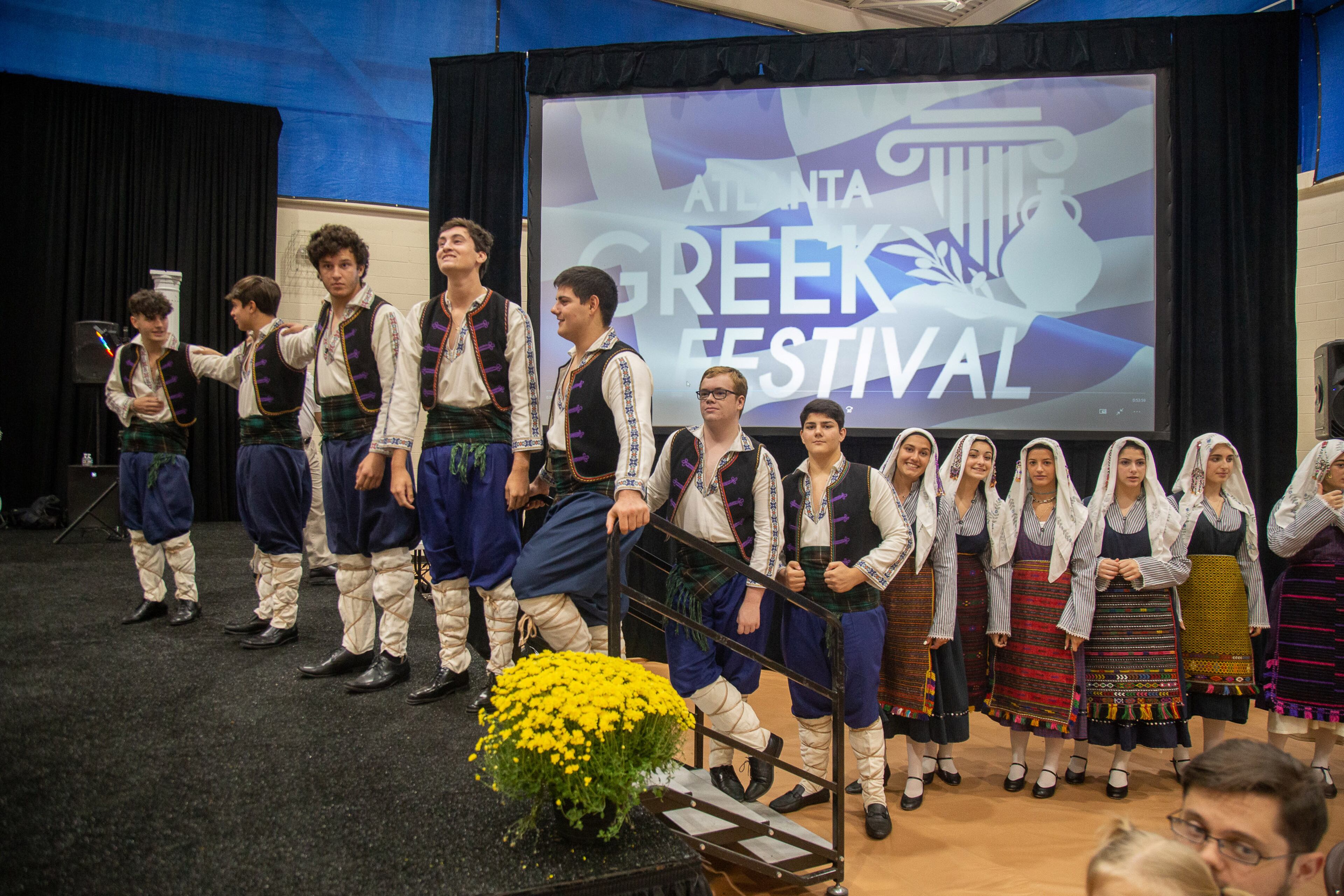 The Anemos Kai Fotia dance group get ready to perform during the Atlanta Greek Festival on Sunday, September 29, 2019. STEVE SCHAEFER / SPECIAL TO THE AJC