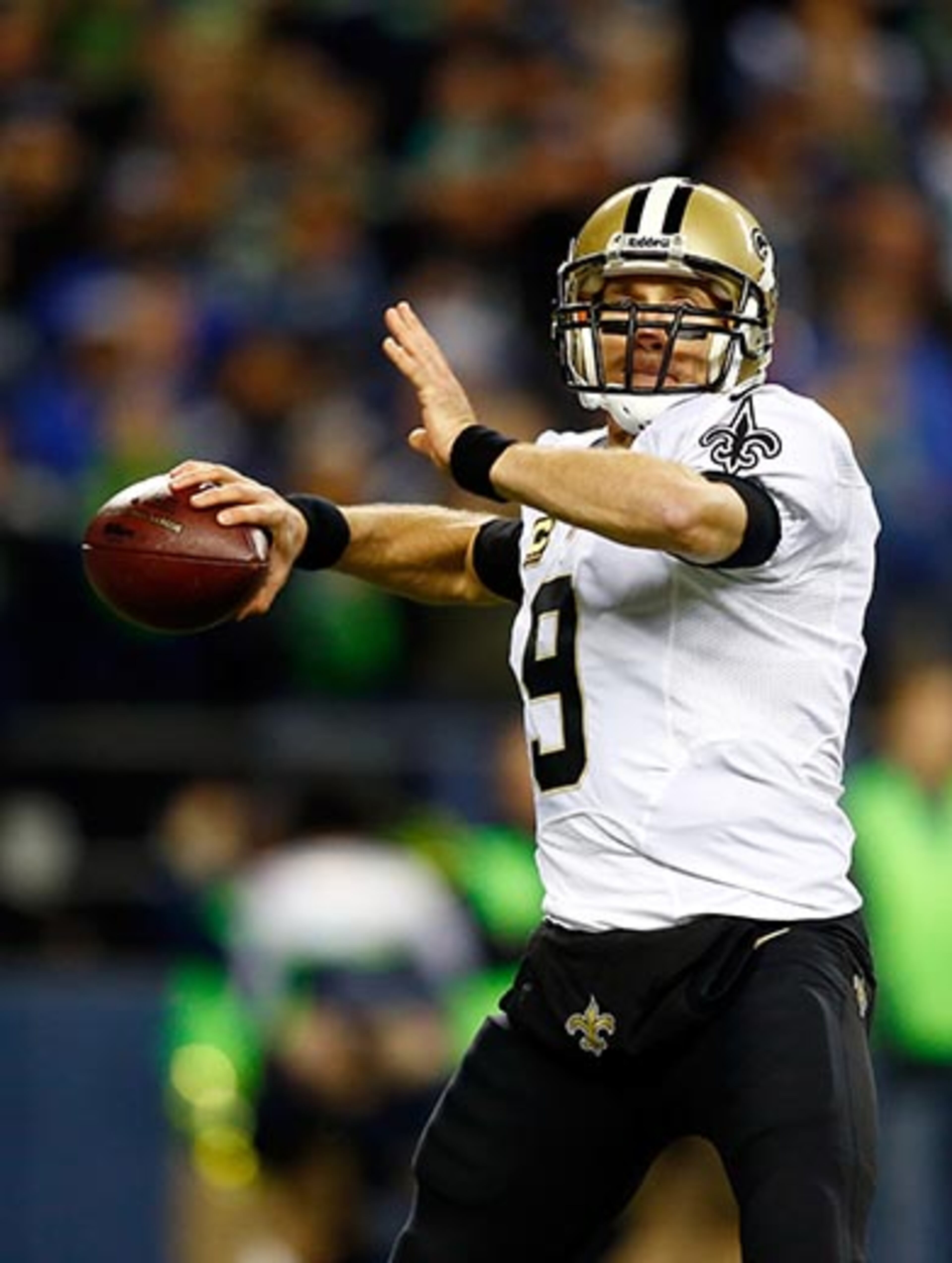 SEATTLE, WA - DECEMBER 02: Quarterback Drew Brees #9 of the New Orleans Saints passes against the Seattle Seahawks during a game at CenturyLink Field on December 2, 2013 in Seattle, Washington. (Photo by Jonathan Ferrey/Getty Images)