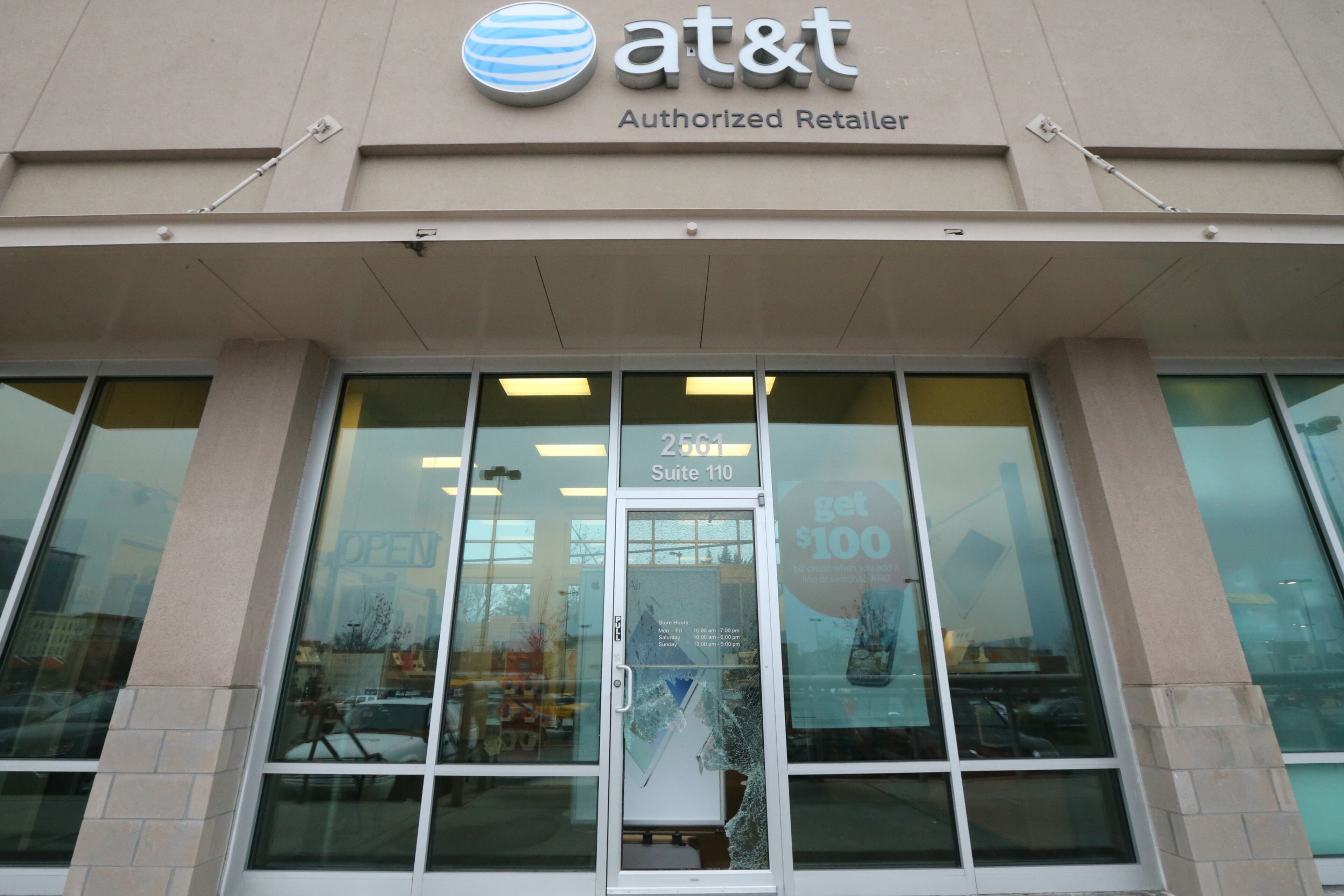 Smash-and-grab burglars who broke into an AT&T store in northeast Atlanta early Tuesday apparently also tried to shoot their way into a storage room, according to police.