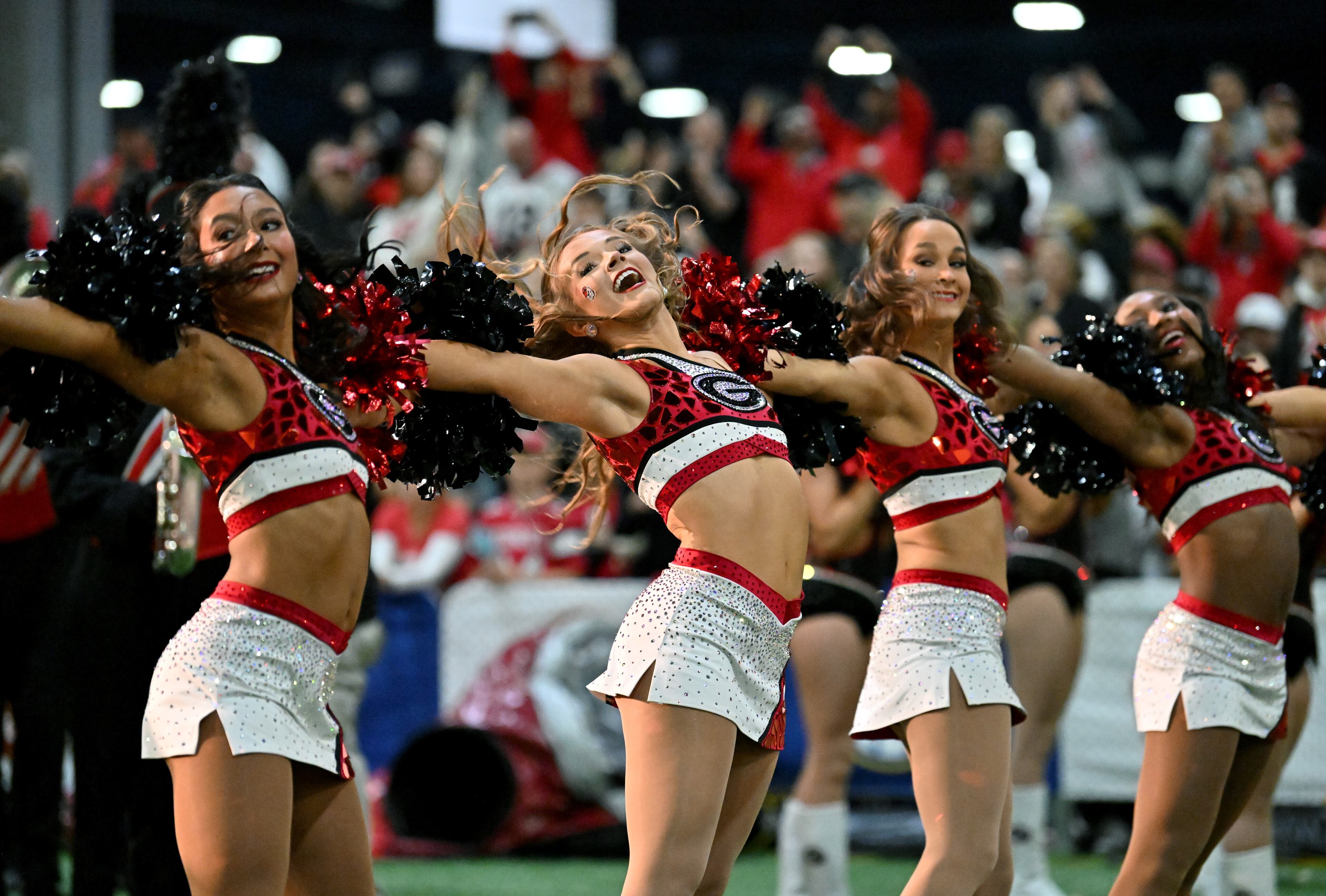 Members of Georgia’s Spirit Squad enter during pep rallies at The Dr Pepper SEC FanFare ahead of the SEC Championship football game between Georgia and Alabama, Saturday, Dec. 6, 2025 in Atlanta. (Hyosub Shin/AJC)
