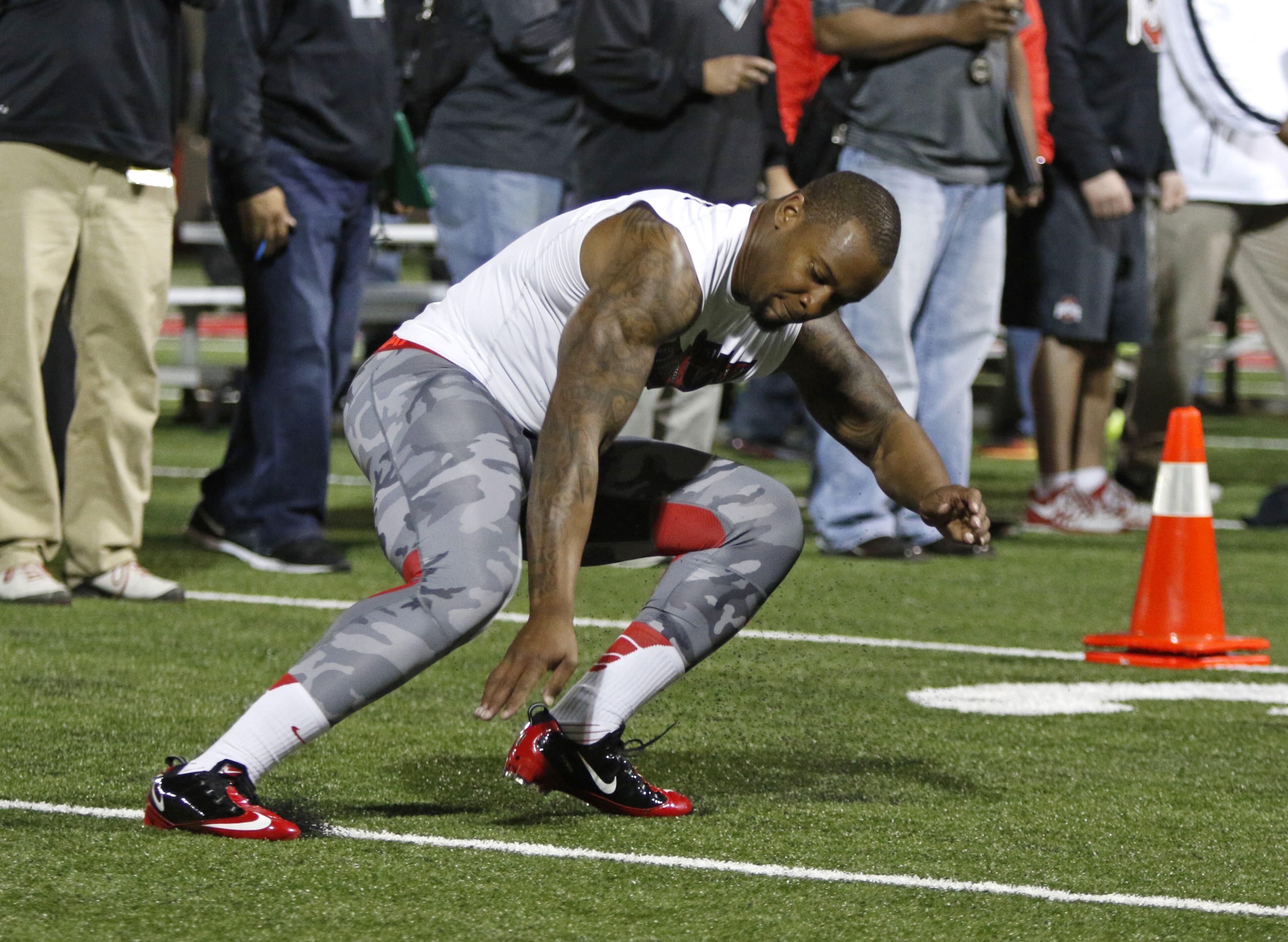 Linebacker Curtis Grant runs a drill during NFL Pro Day at Ohio State University in Columbus, Ohio, Friday, March 13, 2015. (AP Photo/Paul Vernon)