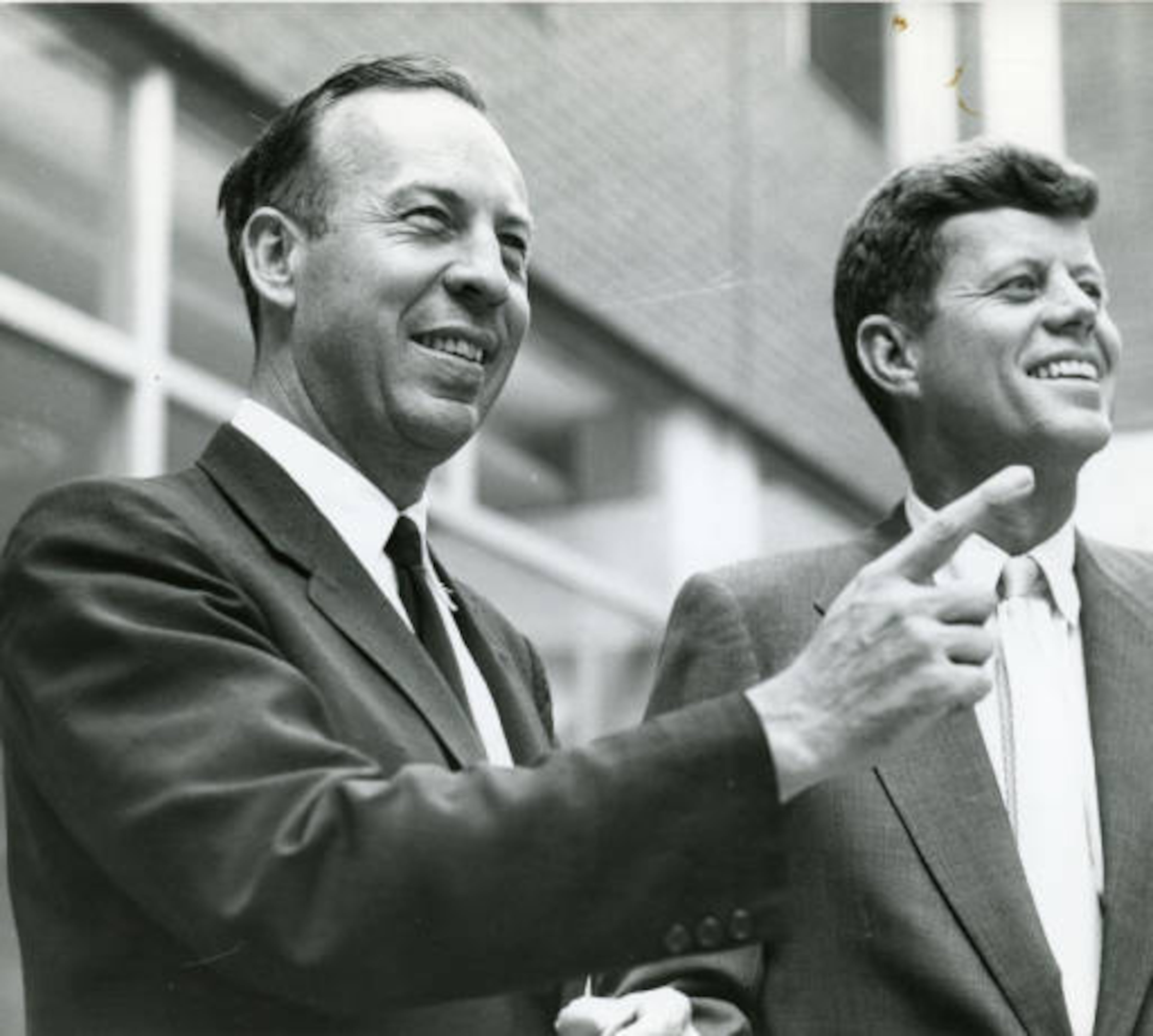 President Kennedy and lawyer Robert B. Troutman share a laugh in Atlanta, circa 1961. Troutman, a personal friend of Kennedy's, headed the President's Committee on Equal Employment Opportunity from 1961-62.