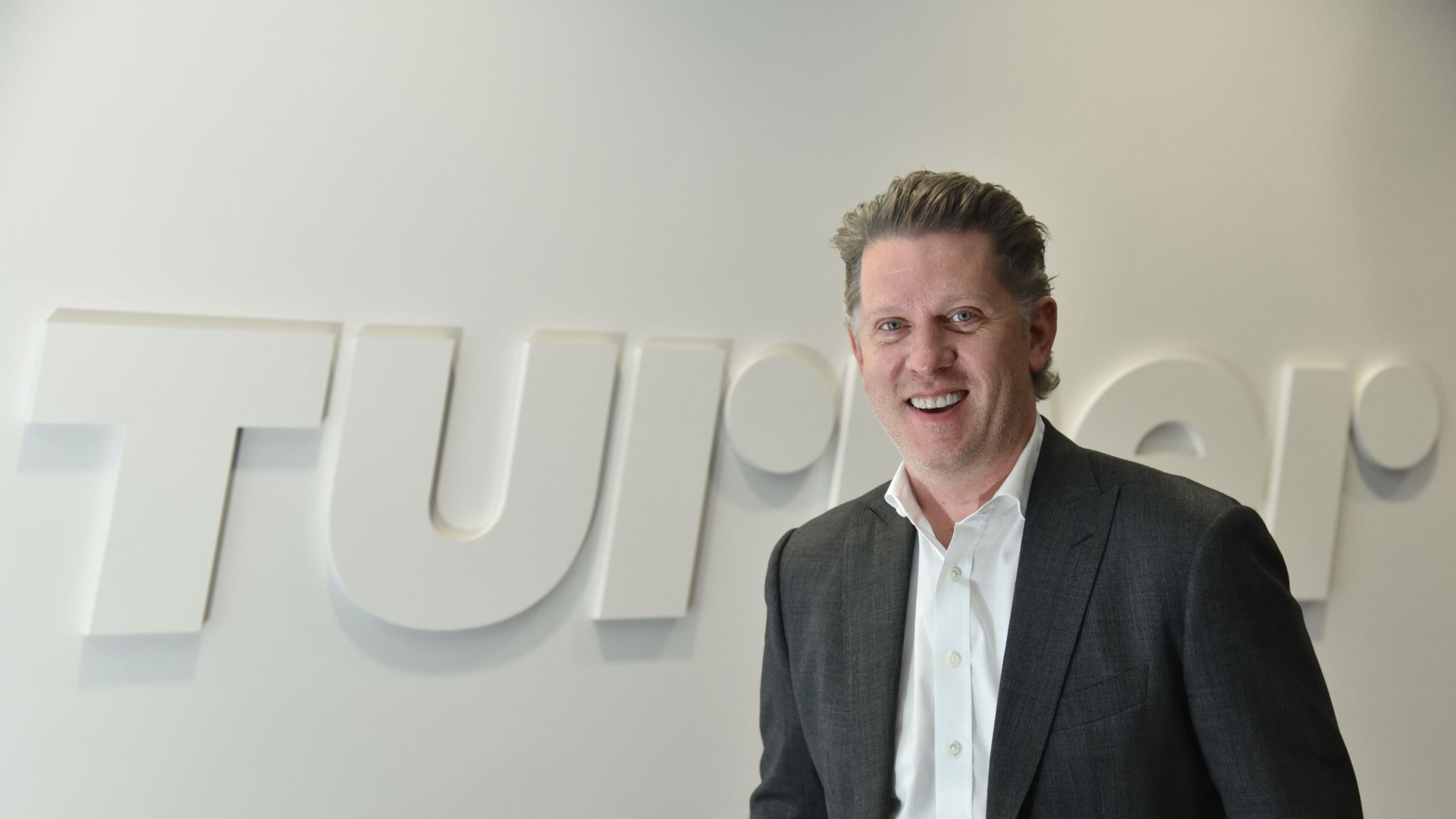 Turner CEO John Martin, shown at the company’s Techwood Campus in Midtown Atlanta, is prepping for changes in the TV industry. He wants to gather lots more information about people who watch the company’s networks, such as TBS, TNT, Cartoon Network and CNN. HYOSUB SHIN / HSHIN@AJC.COM