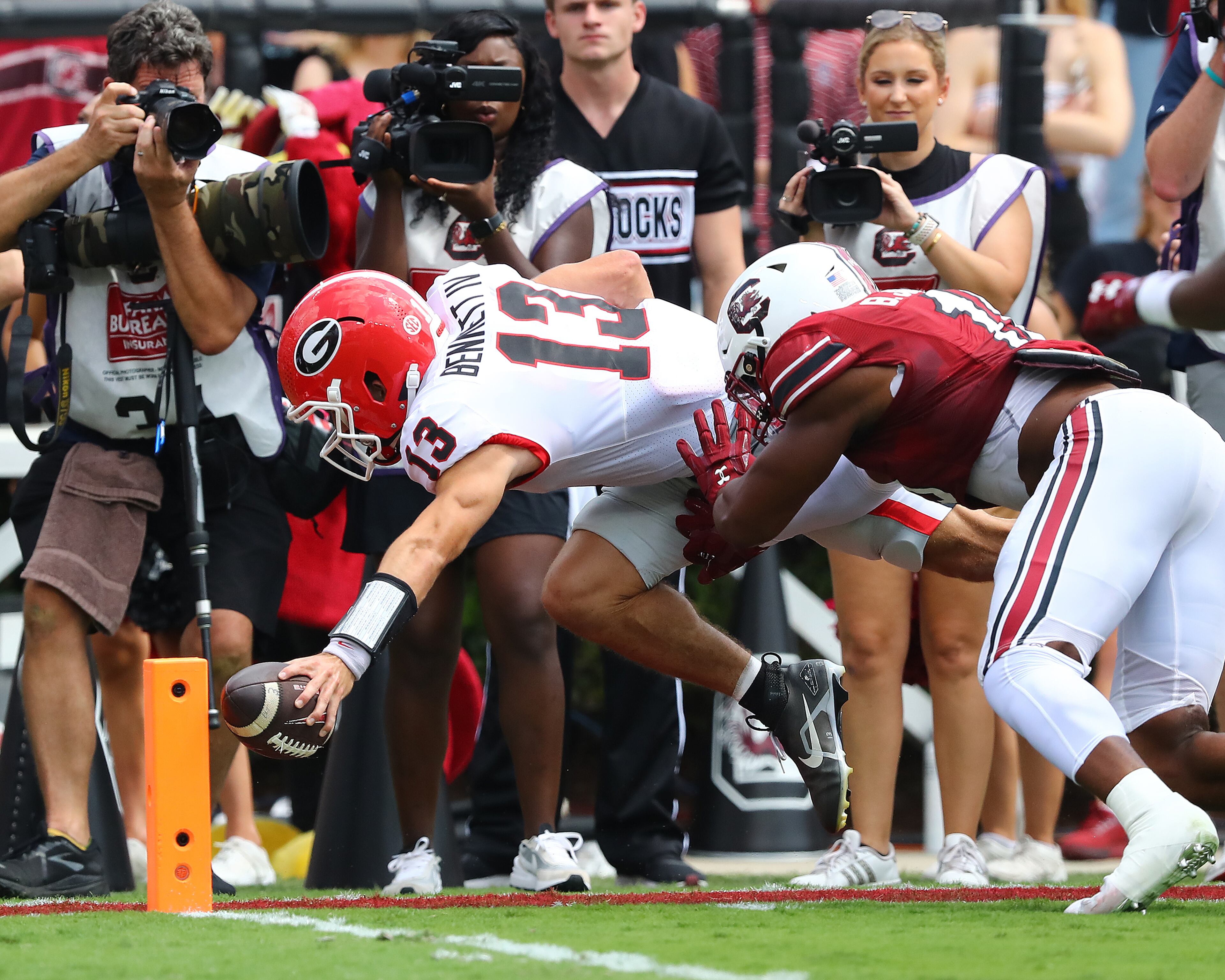 Georgia quarterback Stetson Bennett stretches for the pillon for what was called a touchdown but overturned on review against South Carolina during the first quarter in a NCAA college football game on Saturday, Sept. 17, 2022, in Columbia. Georgia running back Kendall Milton scored a touchdown on the following play for a 14-0 lead. “Curtis Compton / Curtis Compton@ajc.com