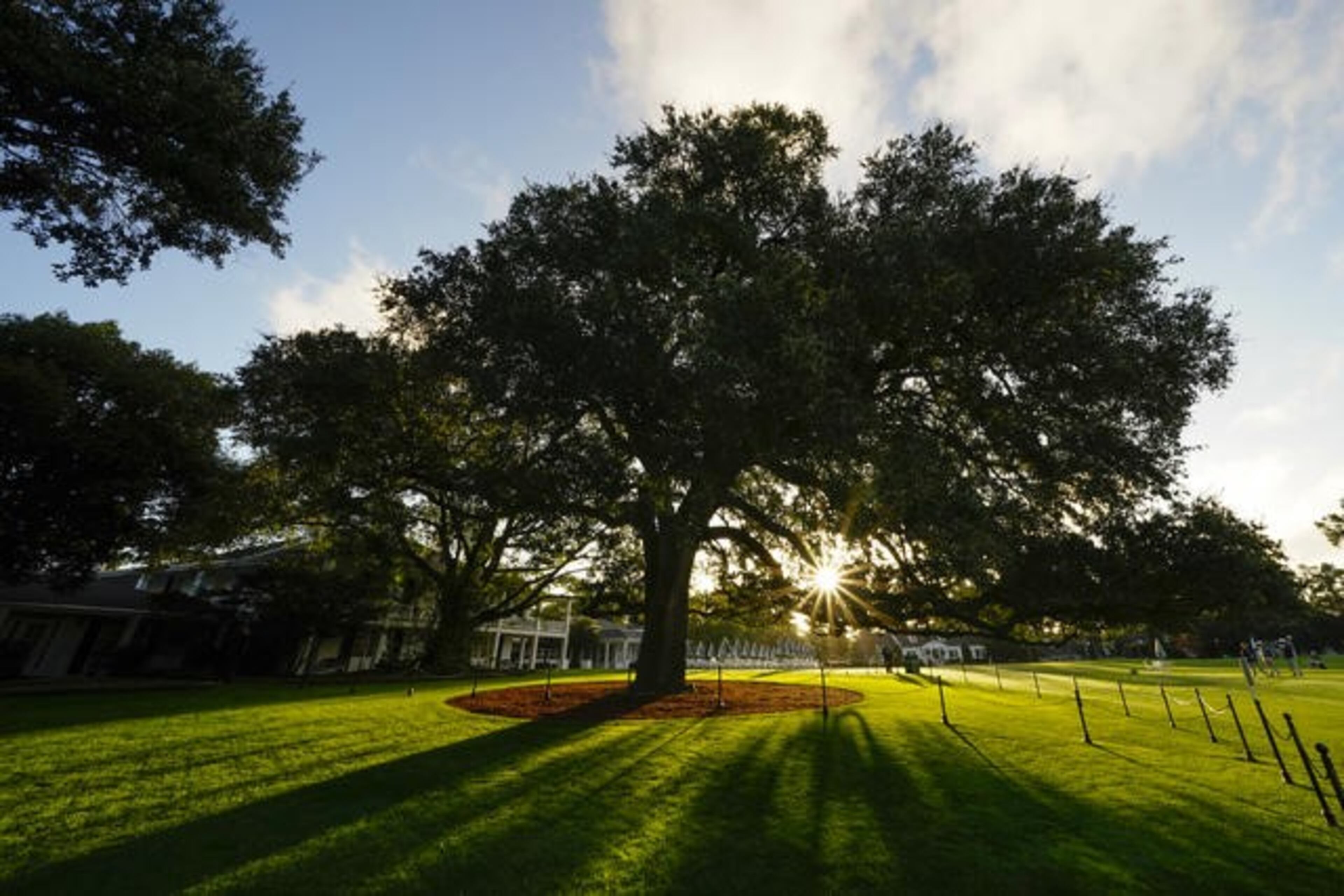 The clubhouse is seen in early morning light during the practice round for the Masters at Augusta National Golf Club Monday, Nov. 9, 2020, in Augusta, Ga..