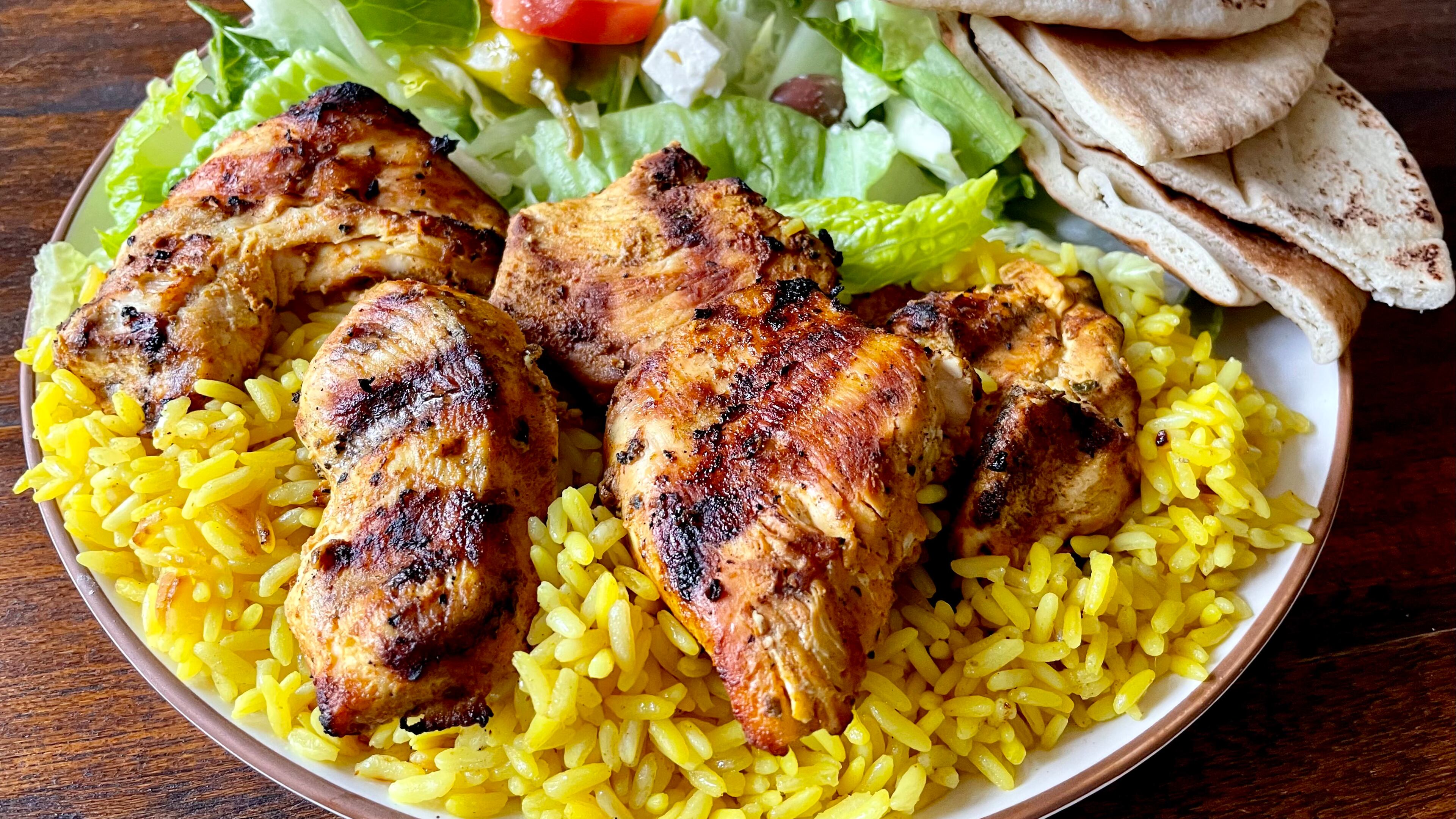 The chicken plate business lunch at Mediterranean Grill includes hunks of skillfully grilled chicken that are juicy and tangy from a yogurt marinade. Angela Hansberger for The Atlanta Journal-Constitution