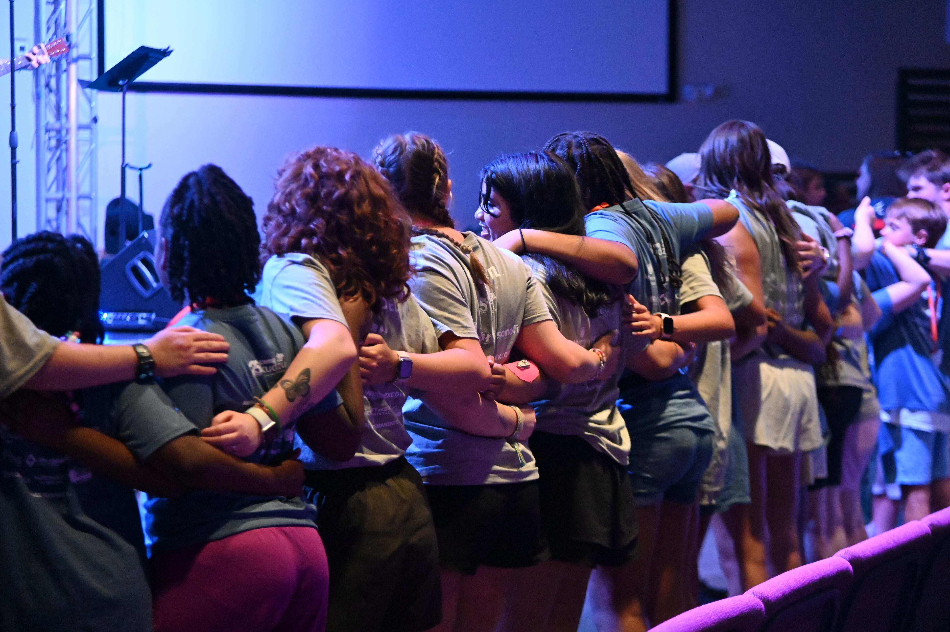Campers bond through music during a recent session of Camp Kudzu, for kids and teens living with Type 1 diabetes. "Giving back just feels good," the AJC's Alexis Stevens writes. "Over the years, so many people volunteered their time so that I could be that kid getting into a canoe for the first time or climbing a tree for a ropes course."