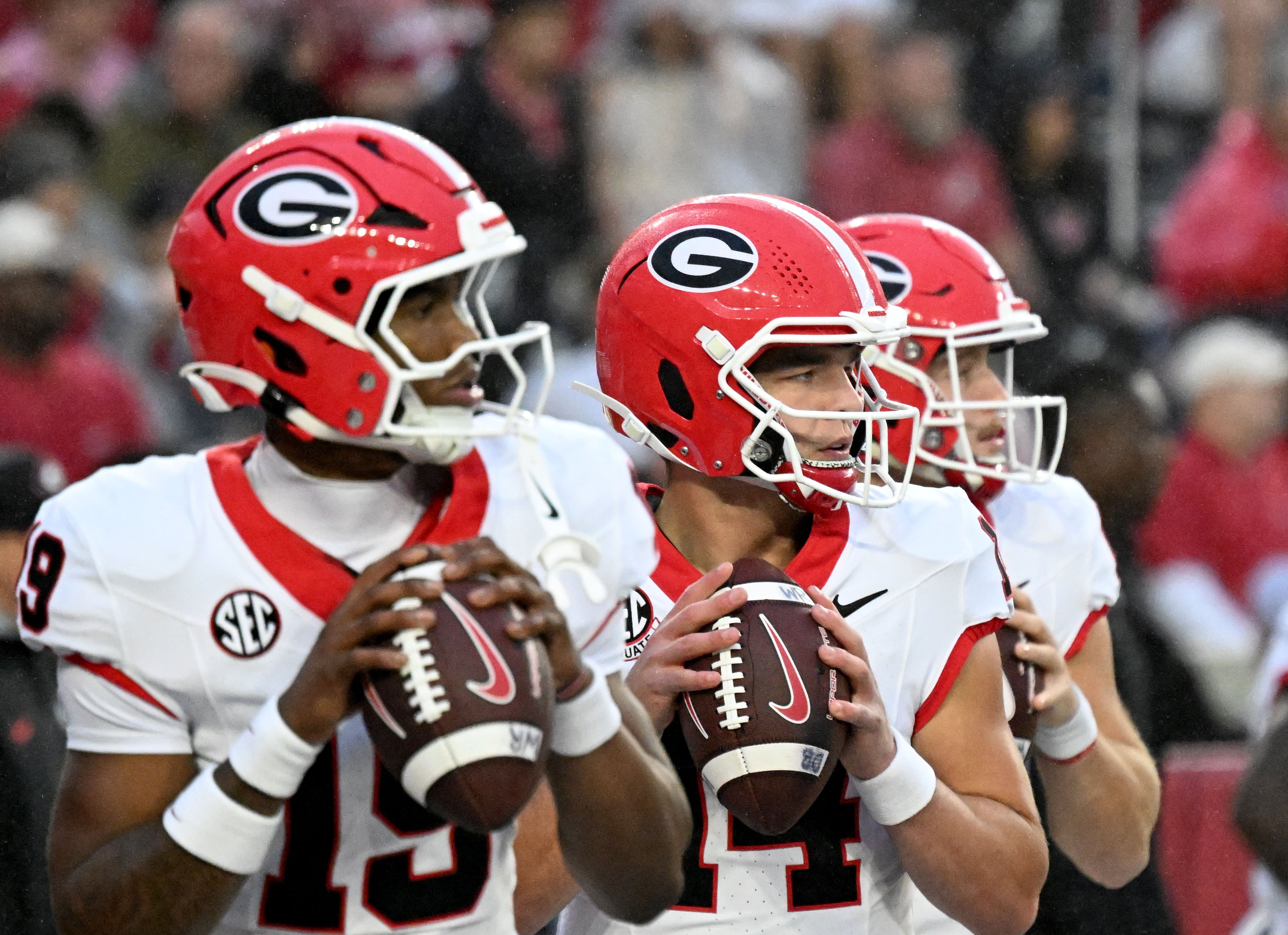 Georgia quarterback Gunner Stockton (center) prepares to throw a ball during pregame warmups before an NCAA football game against Alabama at Bryant-Denny Stadium on Saturday, Oct. 10, 2026, in Tuscaloosa, Alabama. (Hyosub Shin/AJC)
