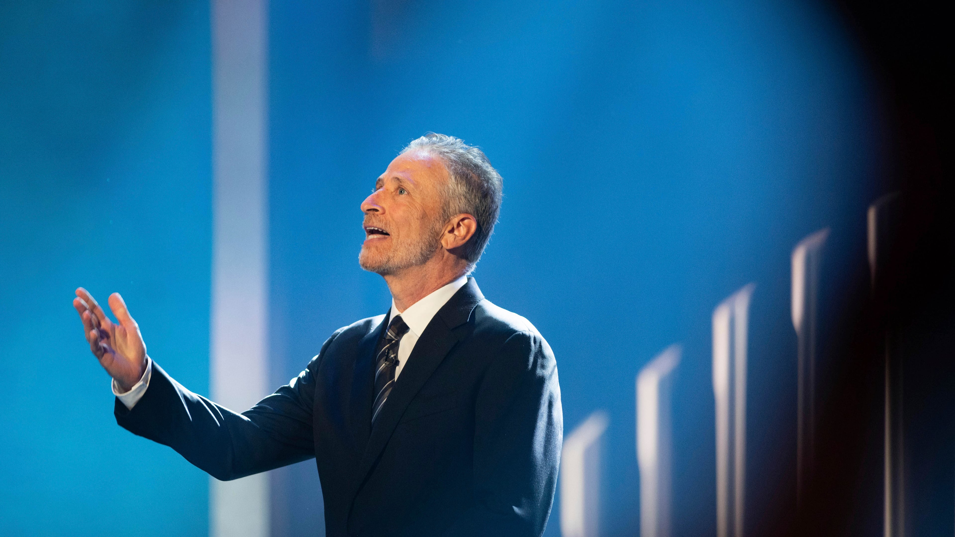 FILE - Mark Twain Prize recipient Jon Stewart is introduced at the start of the 23rd annual Mark Twain Prize for American Humor at the Kennedy Center for the Performing Arts, in Washington, April 24, 2022. (AP Photo/Kevin Wolf, File)