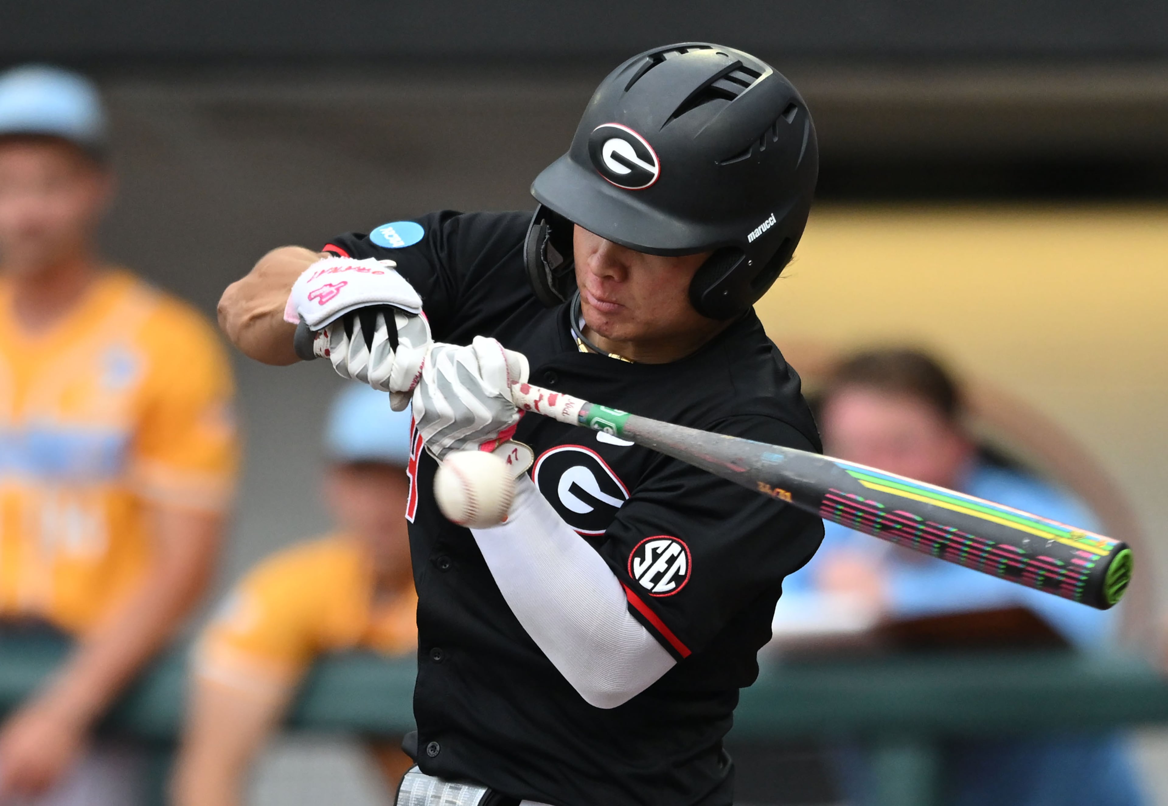 Georgia Kenny Ishikawa (14) hits a single, but advances to third base on a throwing error during the third inning of their NCAA Regional game at Foley Field, Friday, May 29, 2026, in Athens. (Hyosub Shin/AJC)