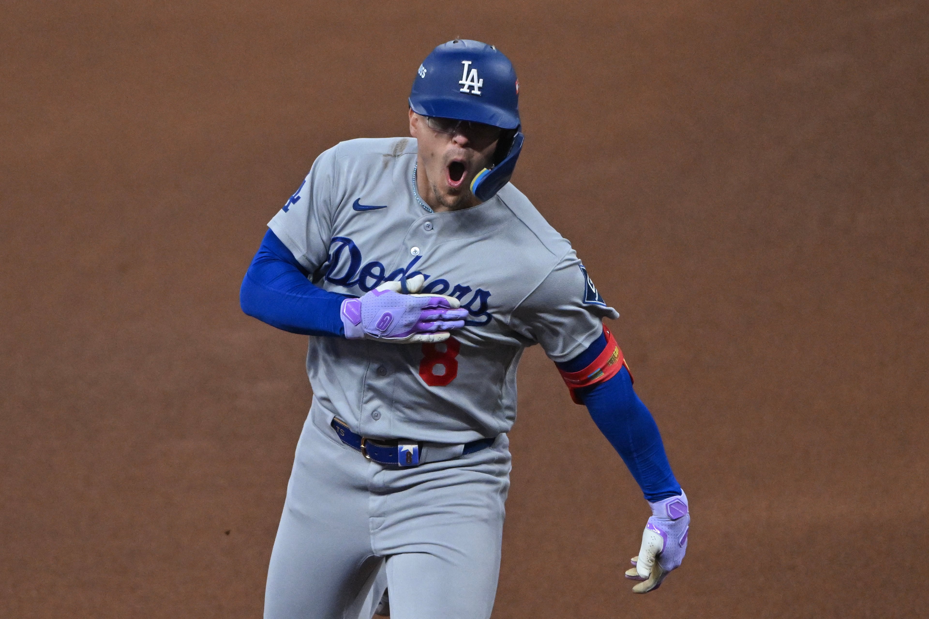 Los Angeles Dodgers third baseman Enrique Hernández (8) reacts while rounding the bases after hitting a two-run home run against the Atlanta Braves during the fourth inning of Game 3 of the MLB National League Division Series between the Atlanta Braves and the Los Angeles Dodgers, Tuesday, Oct. 6, 2026, in Atlanta. (Hyosub Shin/AJC)