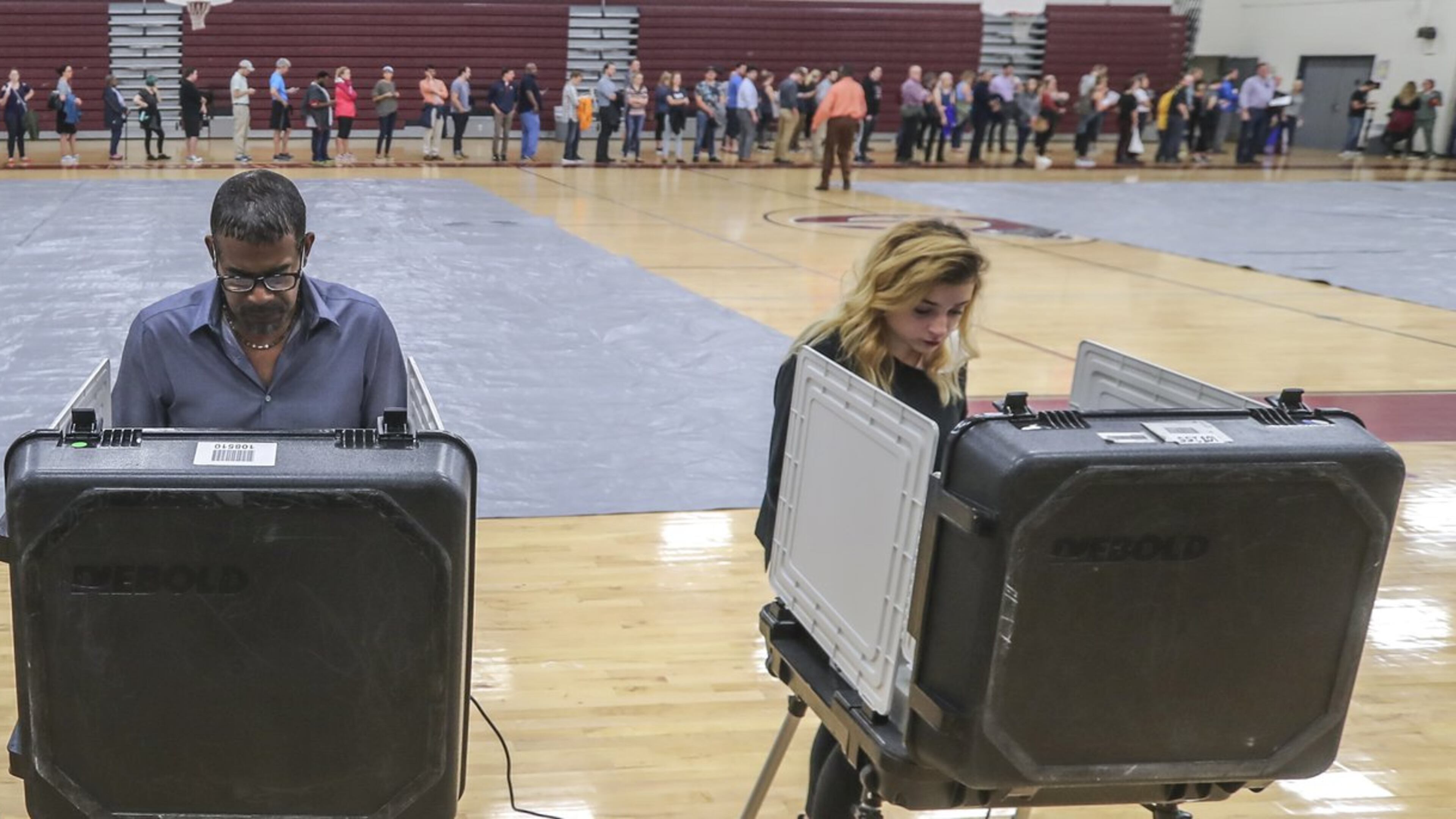 Voters waited over an hour to vote at Henry W. Grady High School in Atlanta on Tuesday Nov. 6, 2018. JOHN SPINK/JSPINK@AJC.COM